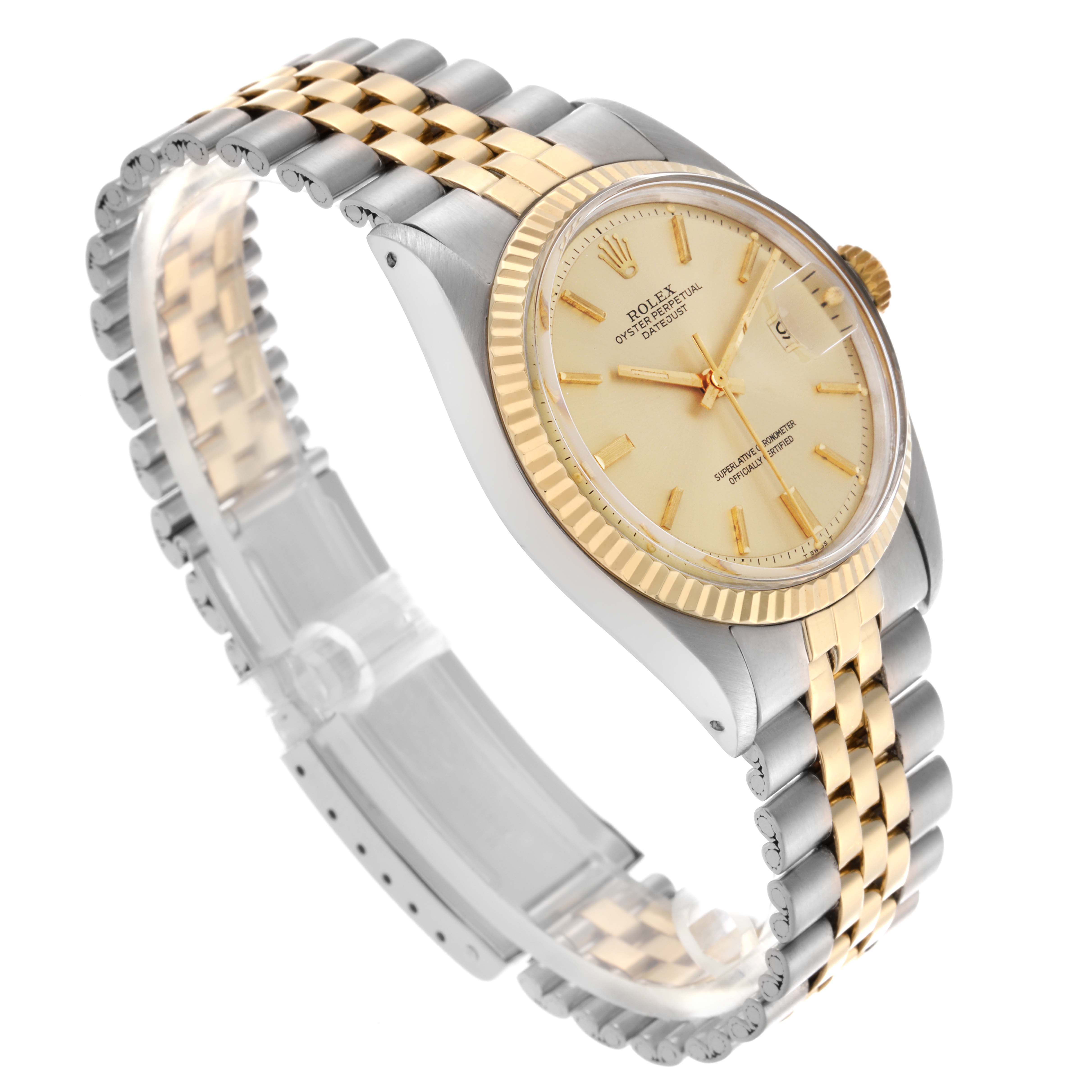 The Rolex Datejust 1601 Men's Steel and Gold (two tone) Champagne Dial 1601 Men's Steel and Gold (two tone) Champagne Dial watch is shown at a three-quarter angle, displaying the dial, bezel, and bracelet.