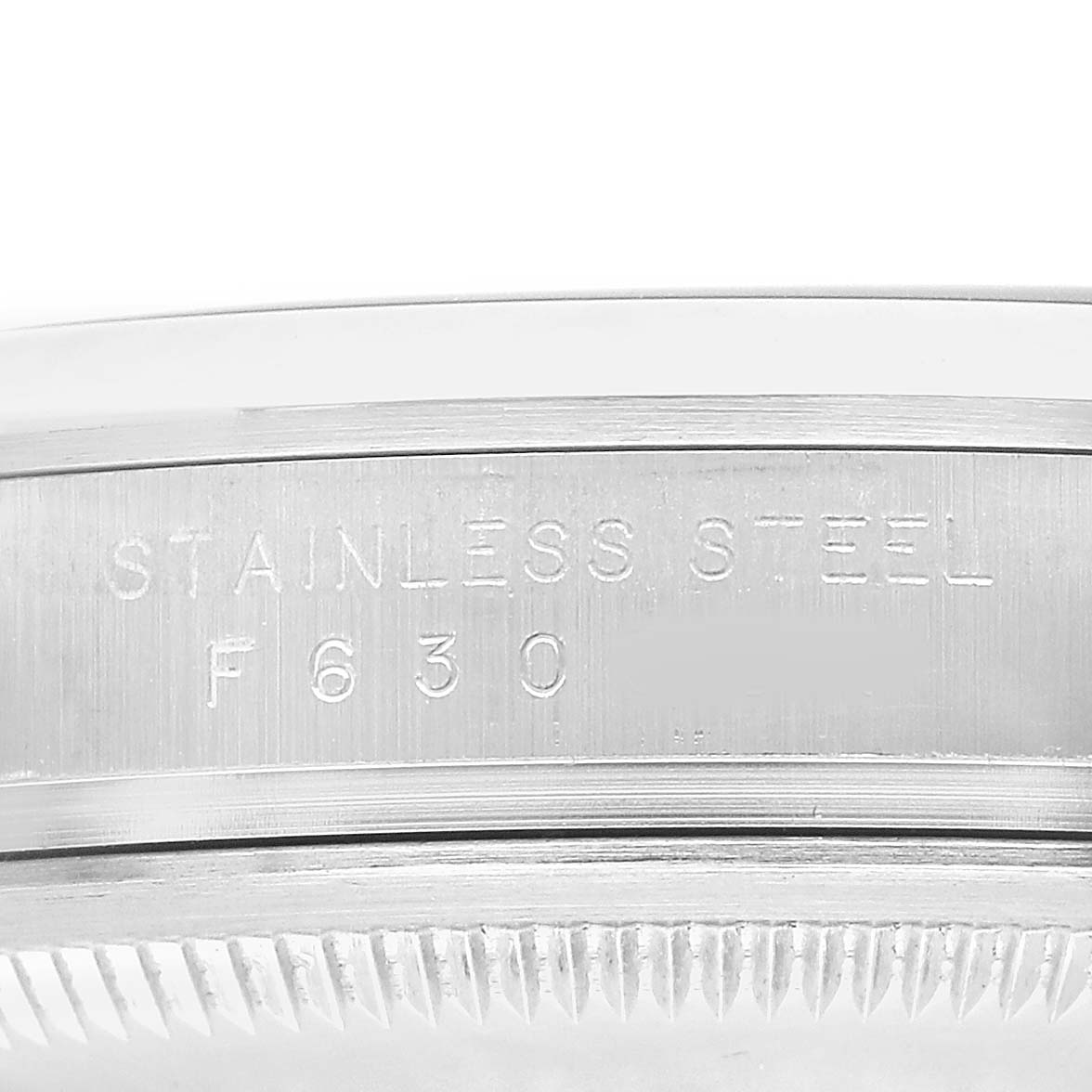The image shows a close-up of the case's edge, focusing on the engravings, for the Rolex Explorer 114270 Men's Stainless Steel Black Dial model.