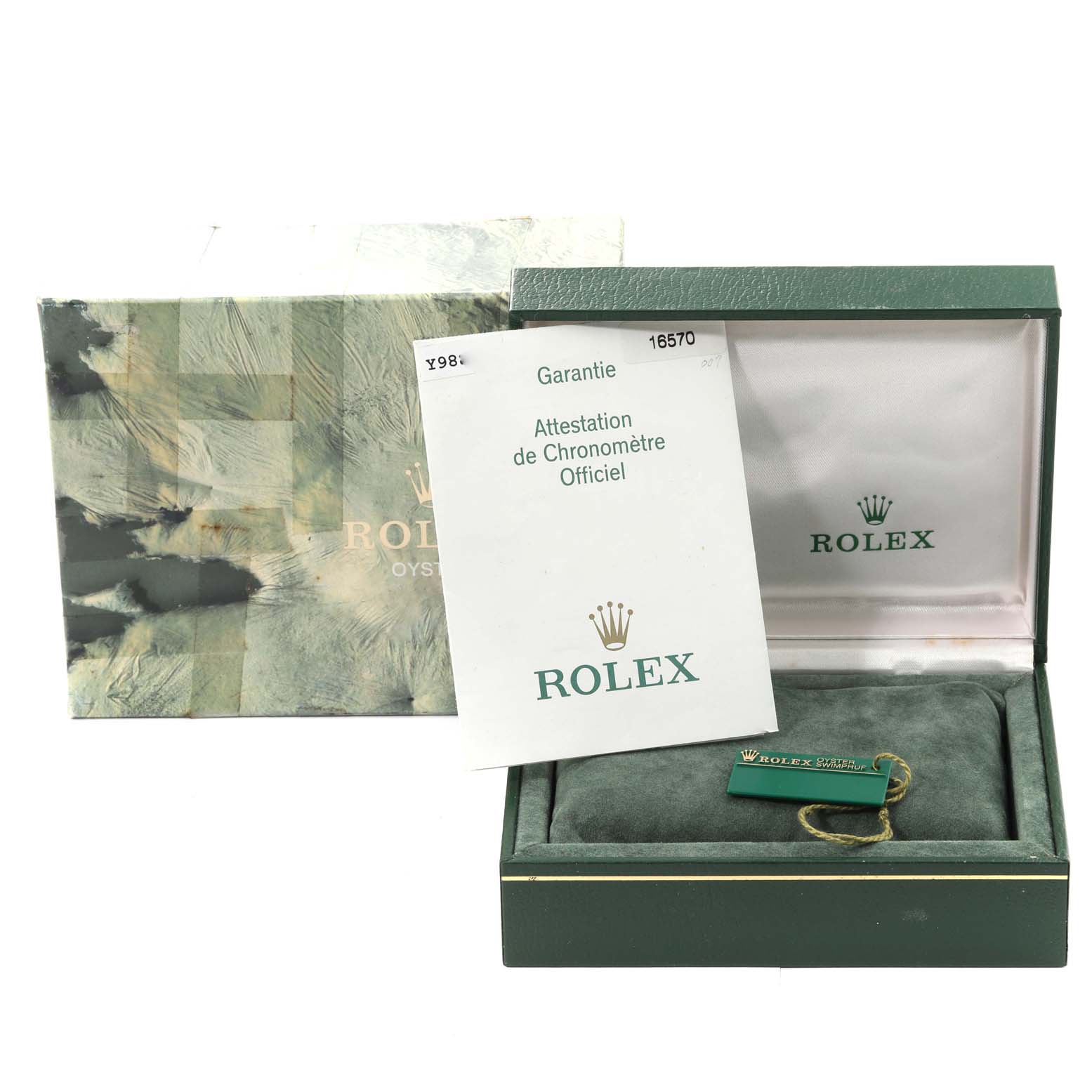 This image shows the packaging and accessories for the Rolex Explorer 16570 Men
s Stainless Steel Black Dial 16570 Men
s Stainless Steel Black Dial model, including the box, tag, and warranty card.