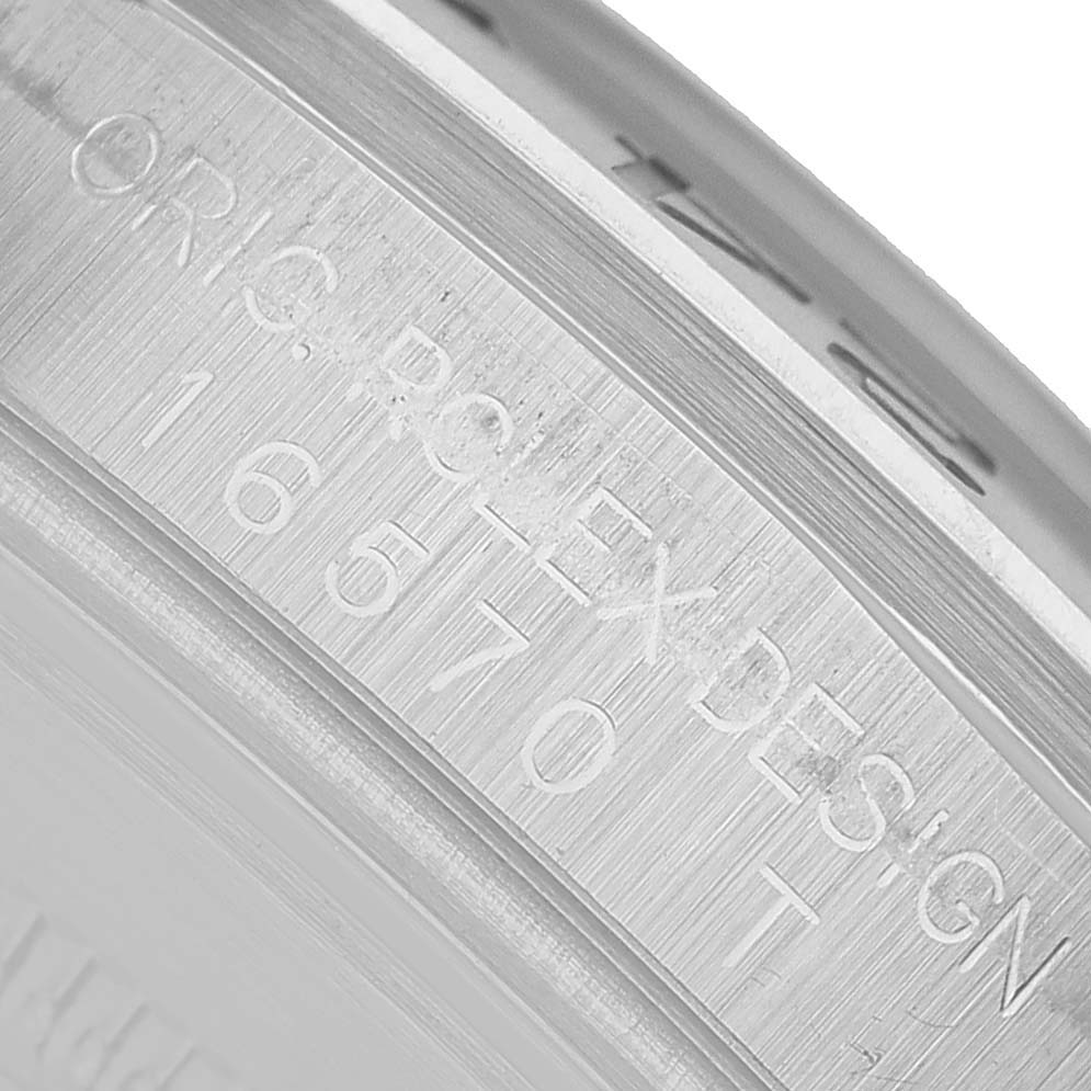 The image shows the engraved inner bezel with model details of the Rolex Explorer 16570 Men's Stainless Steel White Dial watch.