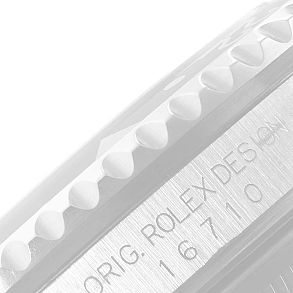 The image shows a close-up of the edge of the bezel and the case side with the model number engraving on a Rolex GMT-Master 16710 Men's Stainless Steel Black Dial 16710 Men's Stainless Steel Black Dial watch.