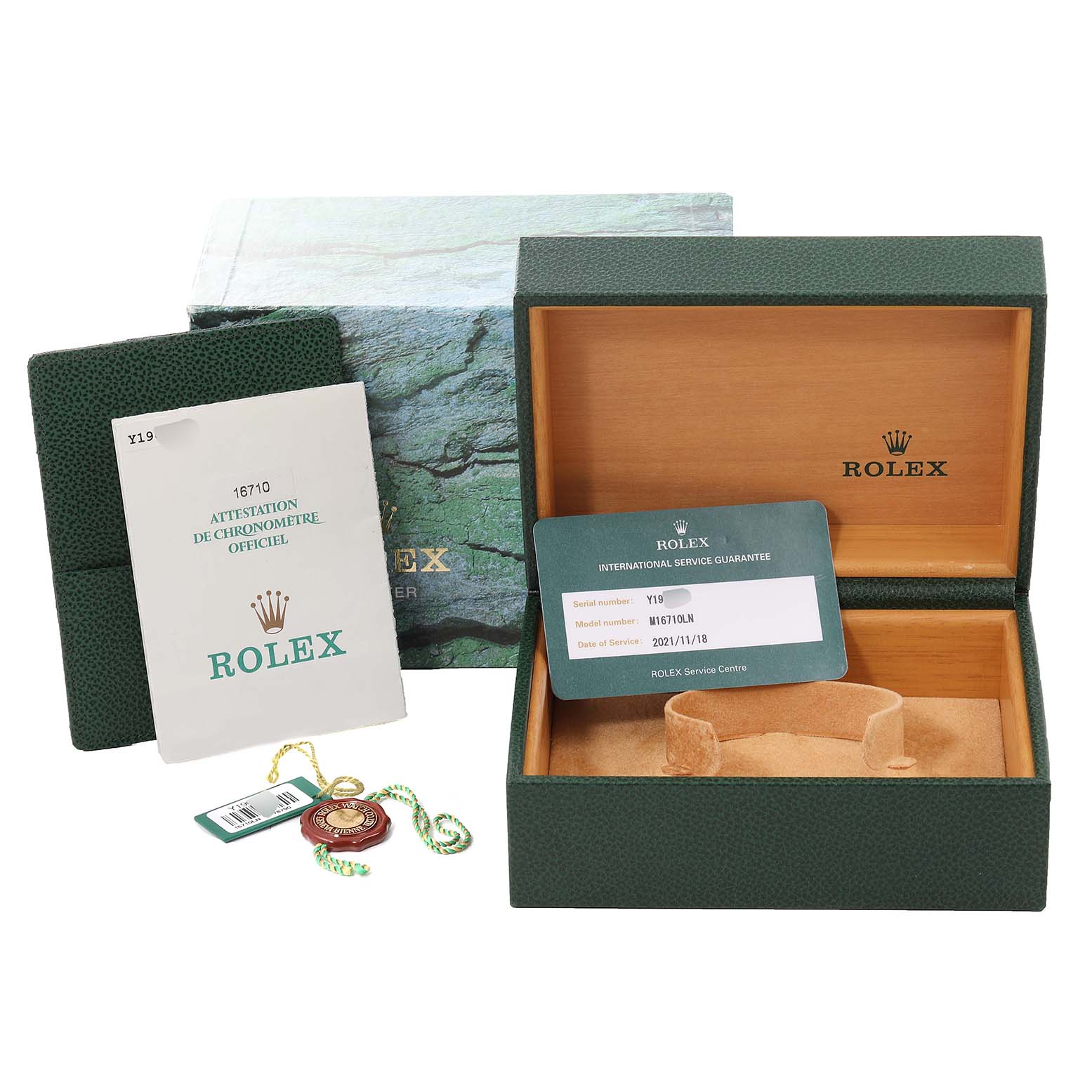 The image shows the packaging, international service guarantee card, tags, and certificate for a Rolex GMT-Master 16710 Men's Stainless Steel Black Dial 16710 Men's Stainless Steel Black Dial watch.