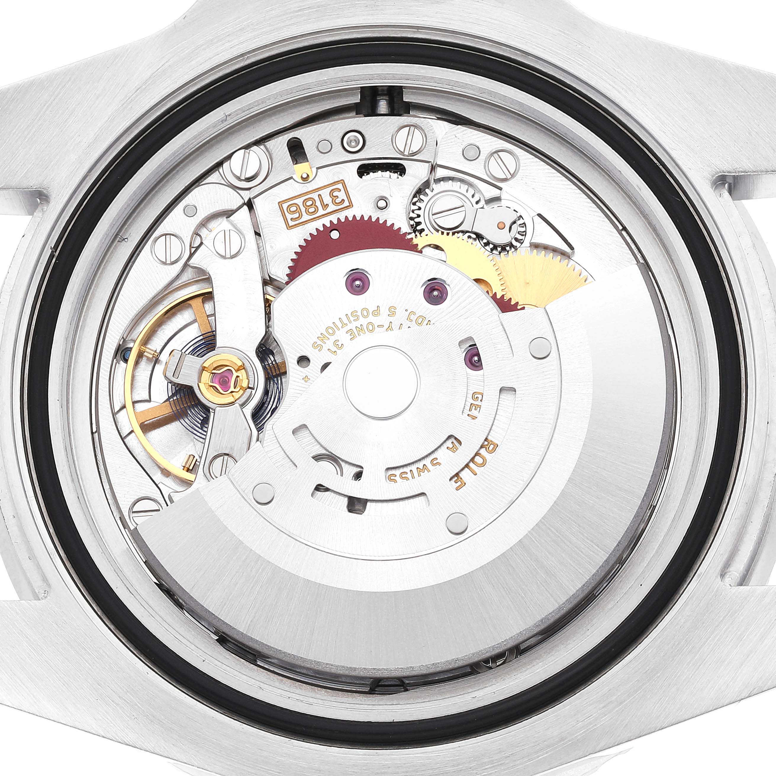 The image shows the back view of a Rolex GMT-Master 116710 Men
s Stainless Steel Black Dial 116710 Men
s Stainless Steel Black Dial watch, displaying its internal movement and mechanical components.