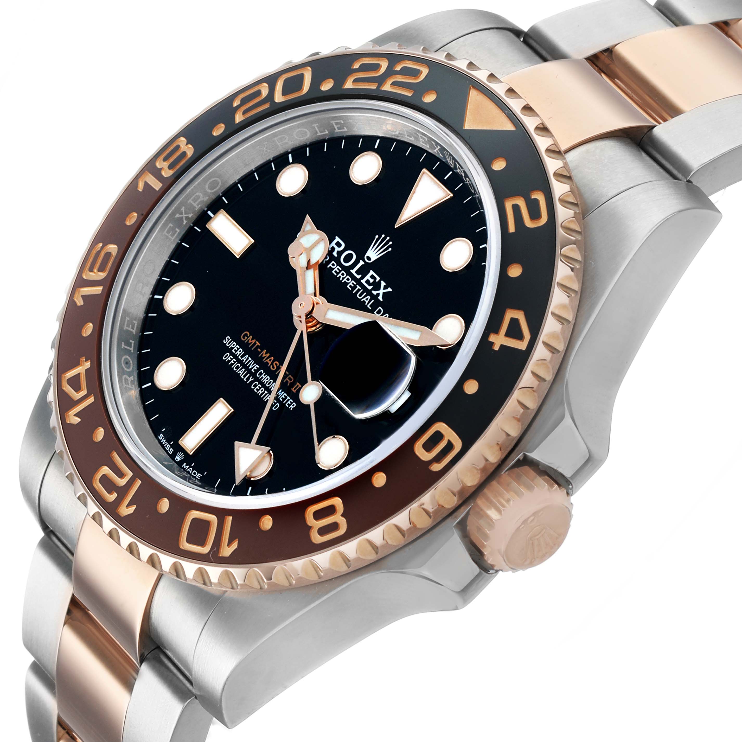The Rolex GMT-Master M126711CHNR - 0002 Men's Steel and Gold (two tone) Black Dial watch is shown from a side angle, highlighting the bezel, crown, and part of the bracelet.