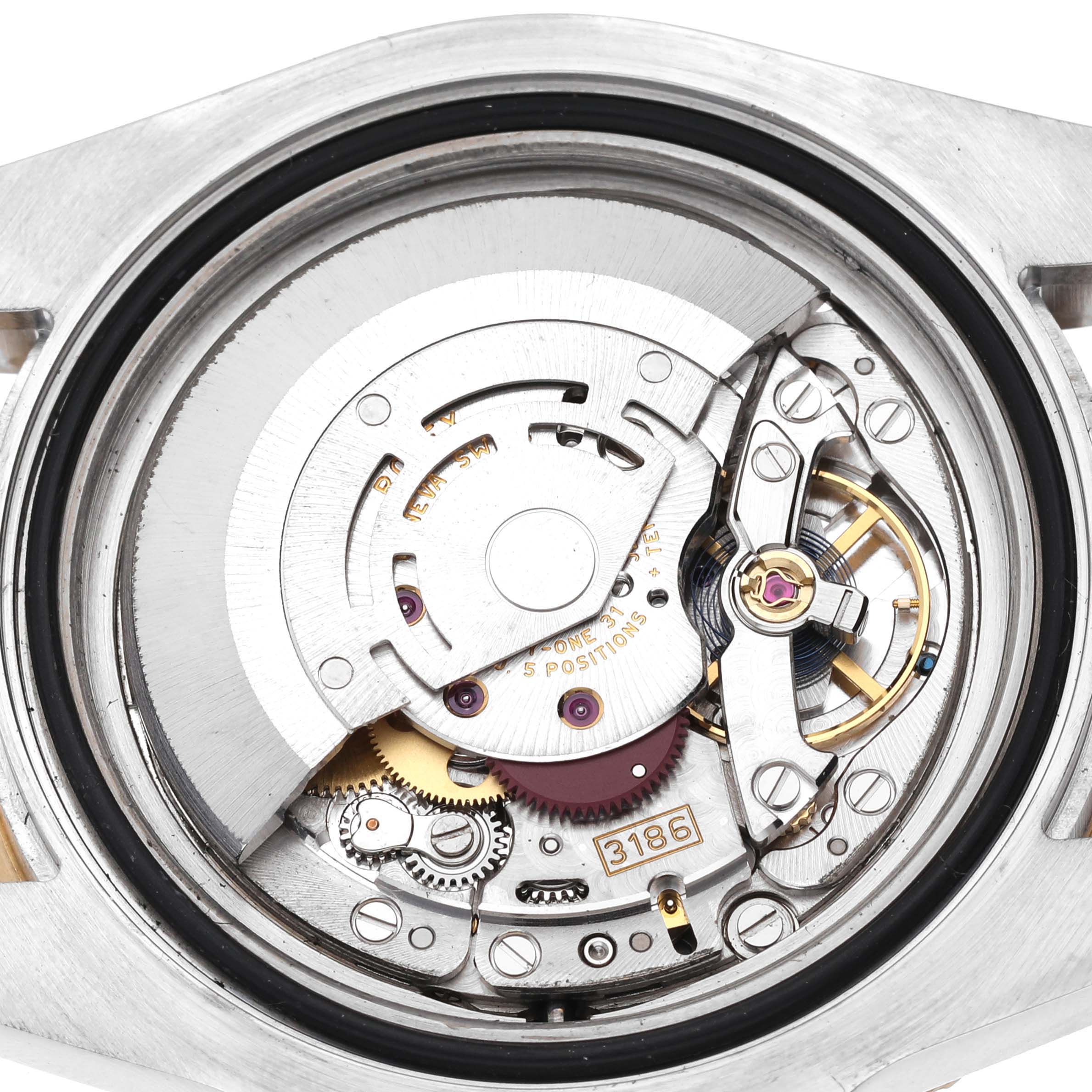 This image shows the internal movement mechanism of a Rolex GMT-Master 116713 Men's Steel and Gold (two tone) Black Dial 116713 Men's Steel and Gold (two tone) Black Dial watch from a close-up, top-down angle.