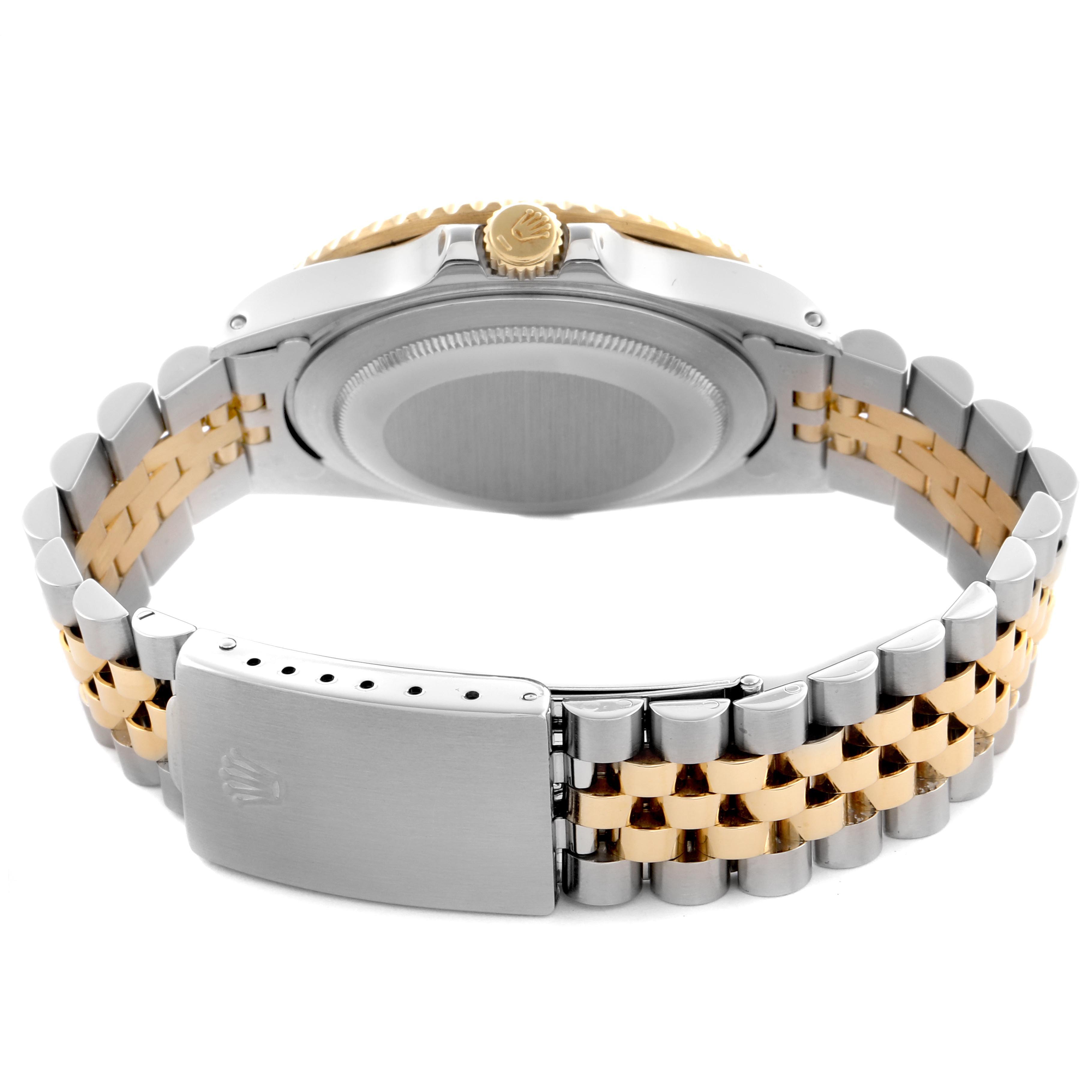 The image shows the back of a Rolex GMT-Master 16713 Men's Steel and Gold (two tone) Black Dial 16713 Men's Steel and Gold (two tone) Black Dial watch, focusing on the bracelet, clasp, and caseback.