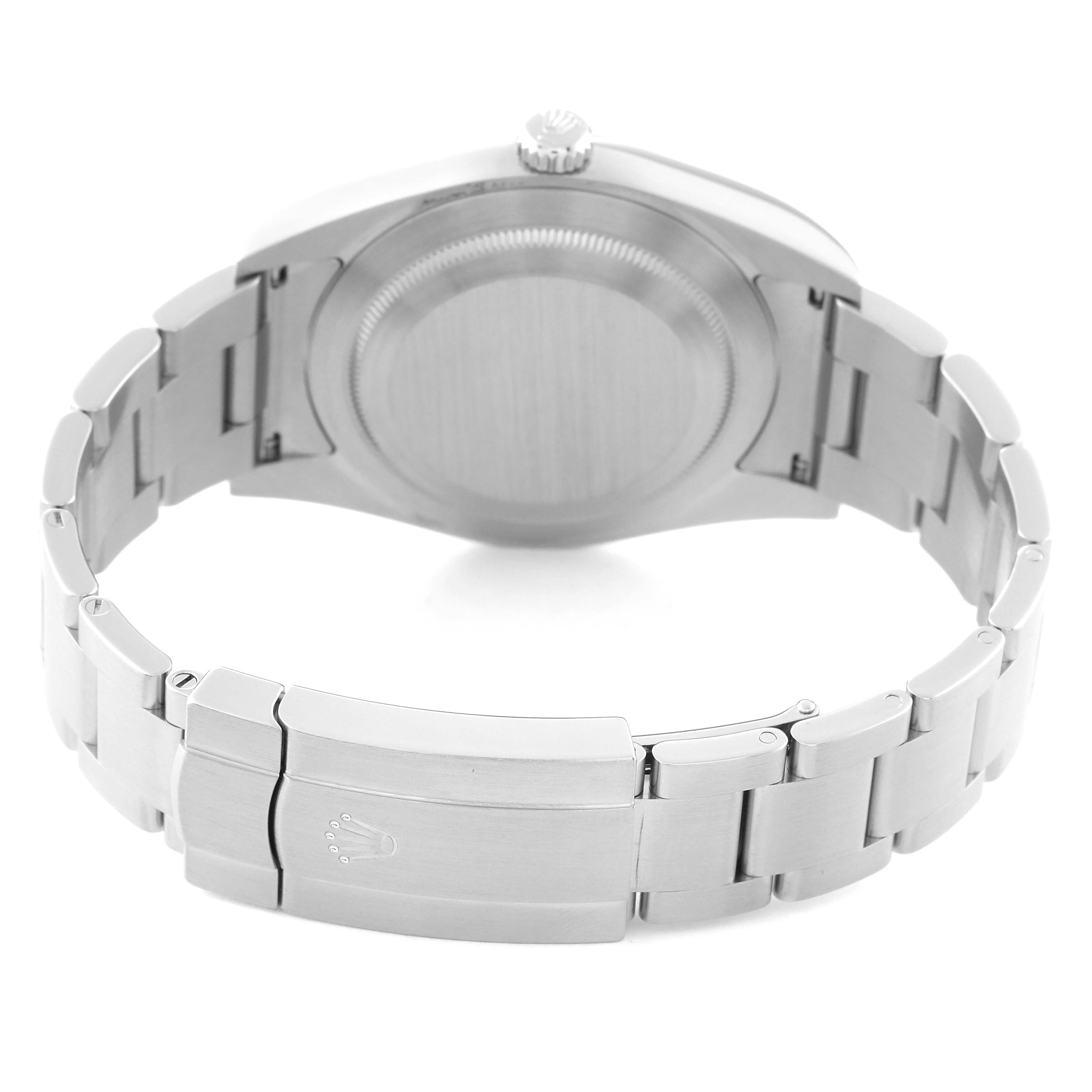 The image shows the backside of the Rolex Oyster Perpetual 114300 Men
s Stainless Steel Black Dial 114300 Men
s Stainless Steel Black Dial watch, focusing on the case back and bracelet clasp.