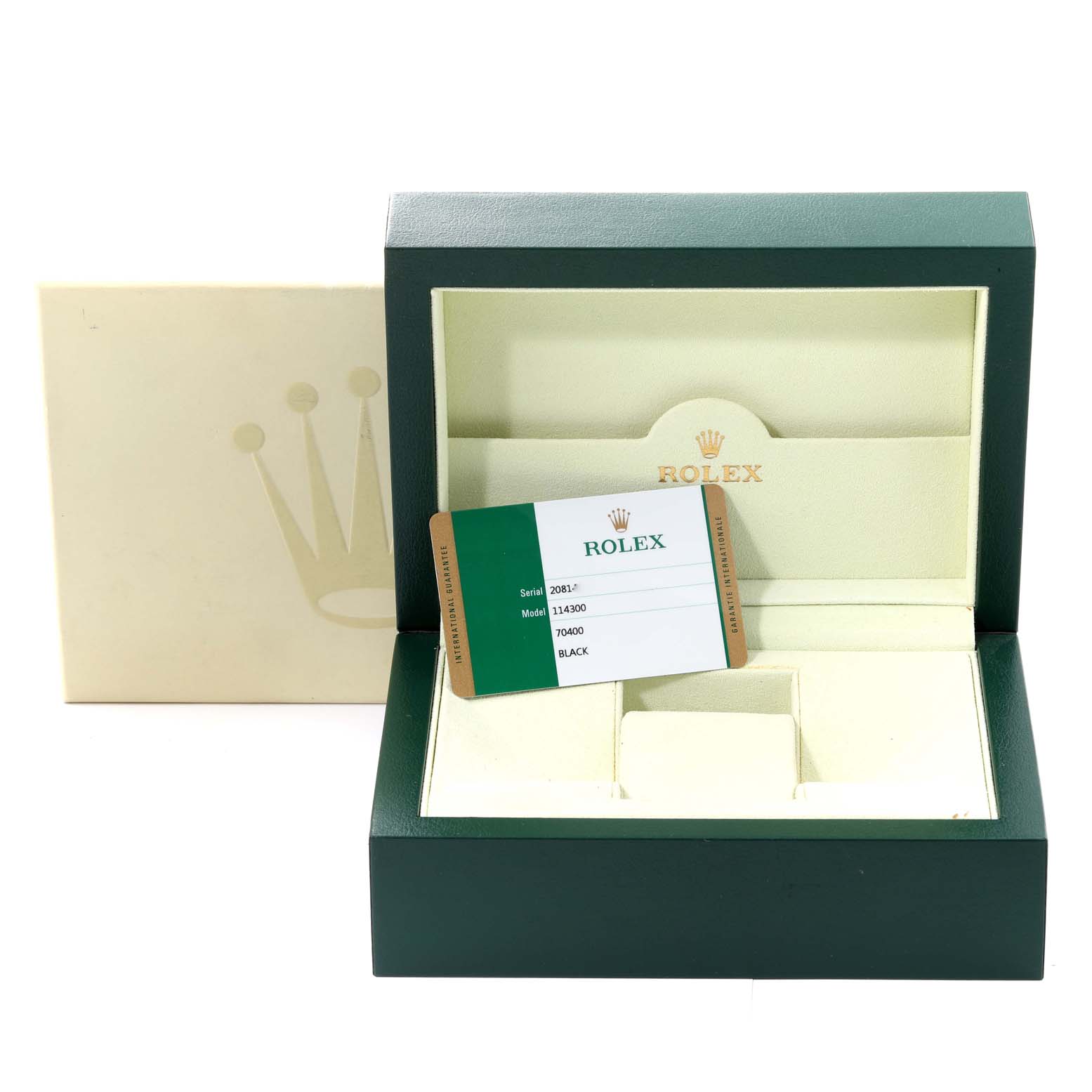 This image shows the box and warranty card for a Rolex Oyster Perpetual 114300 Men
s Stainless Steel Black Dial 114300 Men
s Stainless Steel Black Dial model, without the watch.