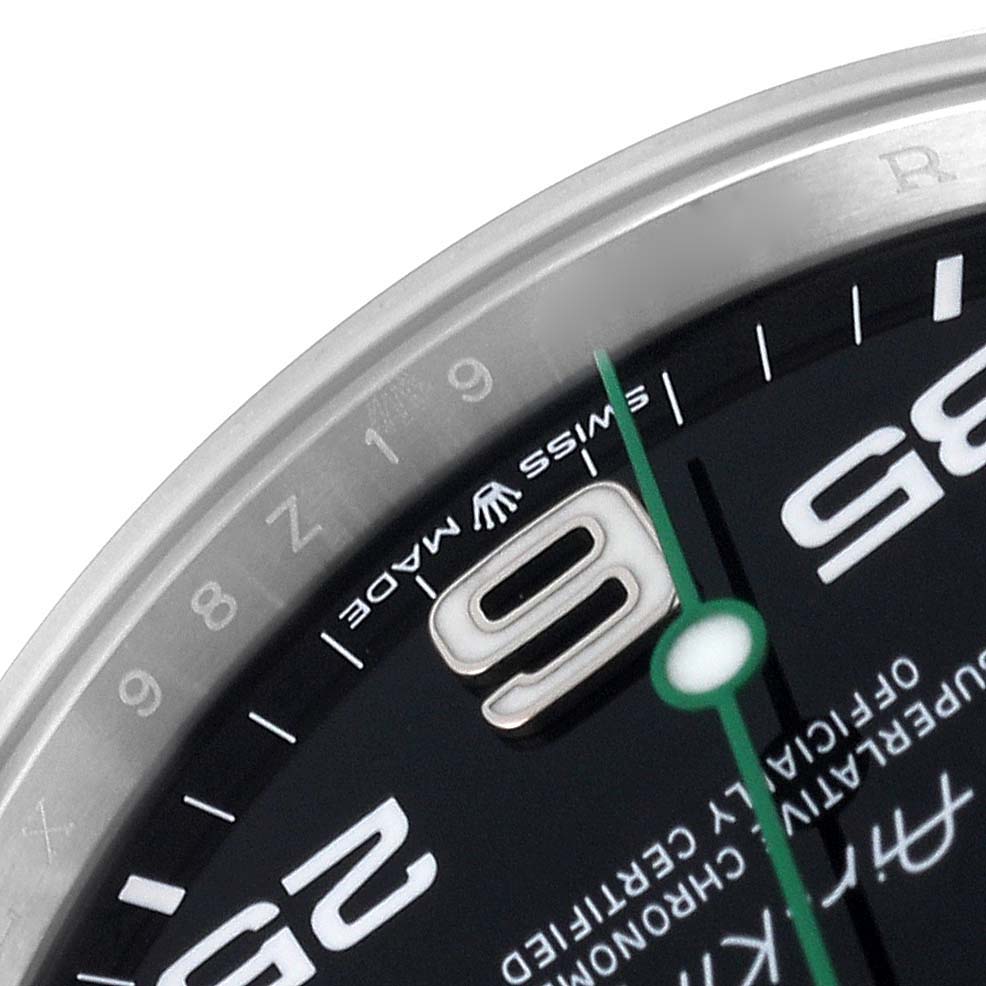 The image shows a close-up of the dial and bezel of a Rolex Air-King 126900 Men's Stainless Steel Black Dial 126900 Men's Stainless Steel Black Dial watch, focusing on the 9 o'clock area.