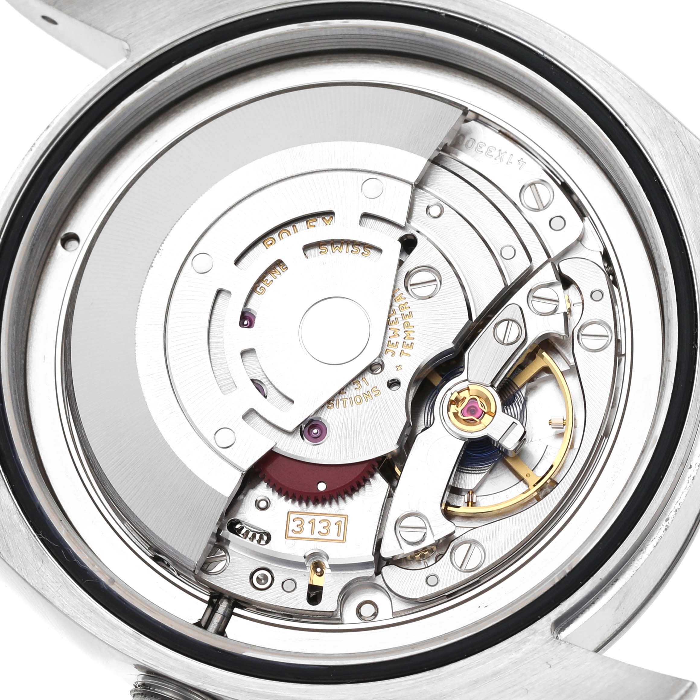 The image shows a close-up of the movement mechanism inside the Rolex Air-King 116900 Men's Stainless Steel Black Dial 116900 Men's Stainless Steel Black Dial watch, highlighting its intricate parts.