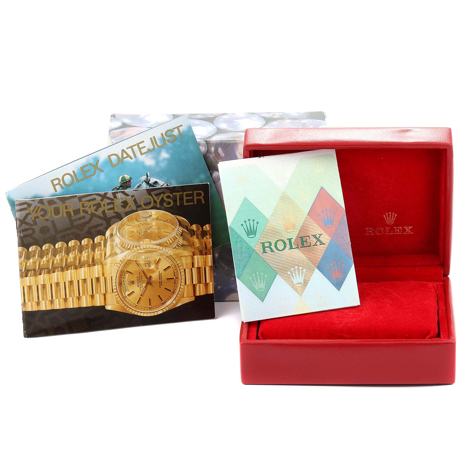 The image shows a Rolex Oyster Perpetual 76183 Women's Steel and Gold (two tone) Silver Dial 76183 Women's Steel and Gold (two tone) Silver Dial box, along with brochures and paperwork, viewed from a front angle.