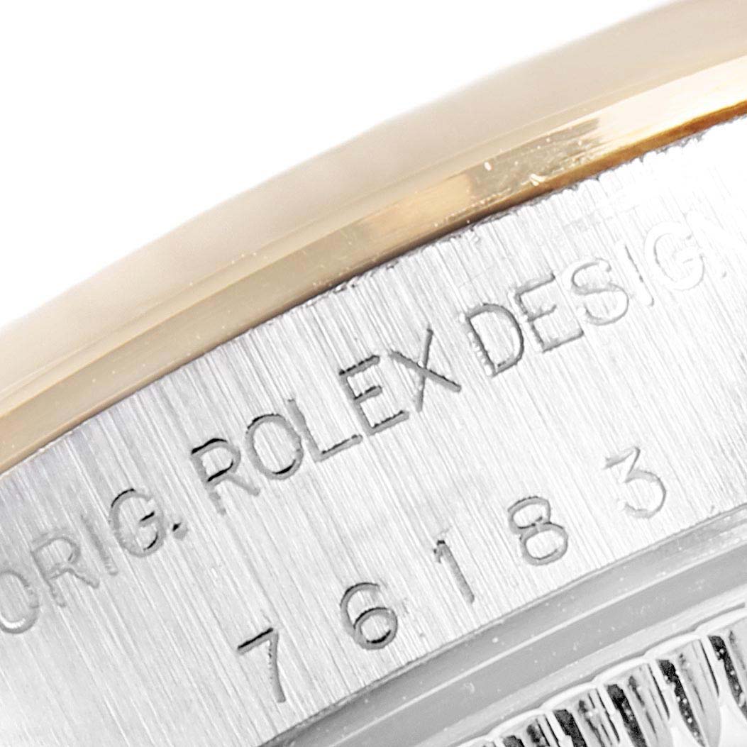 The image shows a close-up of the engraved caseback on a Rolex Oyster Perpetual 76183 Women's Steel and Gold (two tone) Silver Dial 76183 Women's Steel and Gold (two tone) Silver Dial watch.