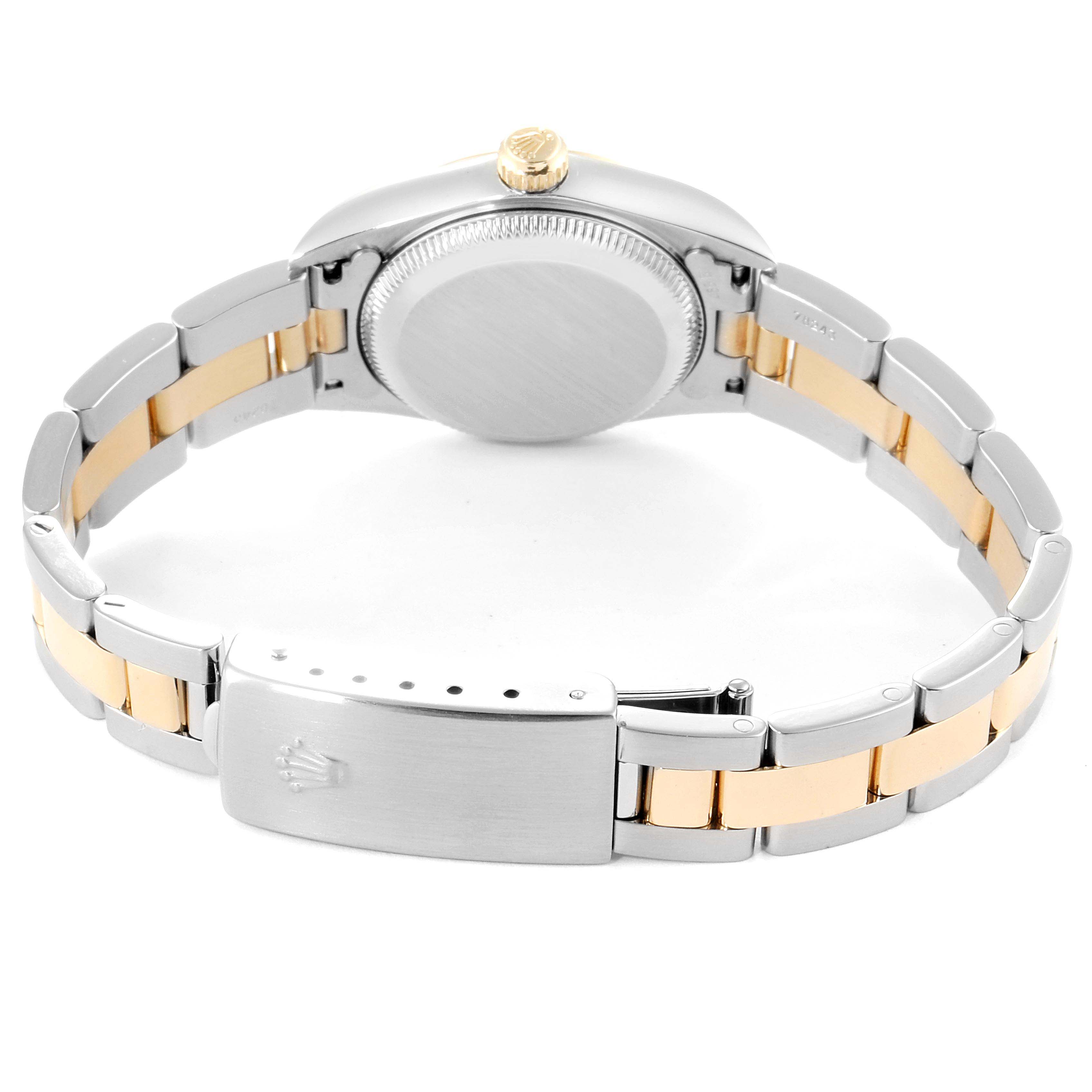 This image shows the back side and band of a Rolex Oyster Perpetual 76183 Women's Steel and Gold (two tone) Silver Dial 76183 Women's Steel and Gold (two tone) Silver Dial watch.