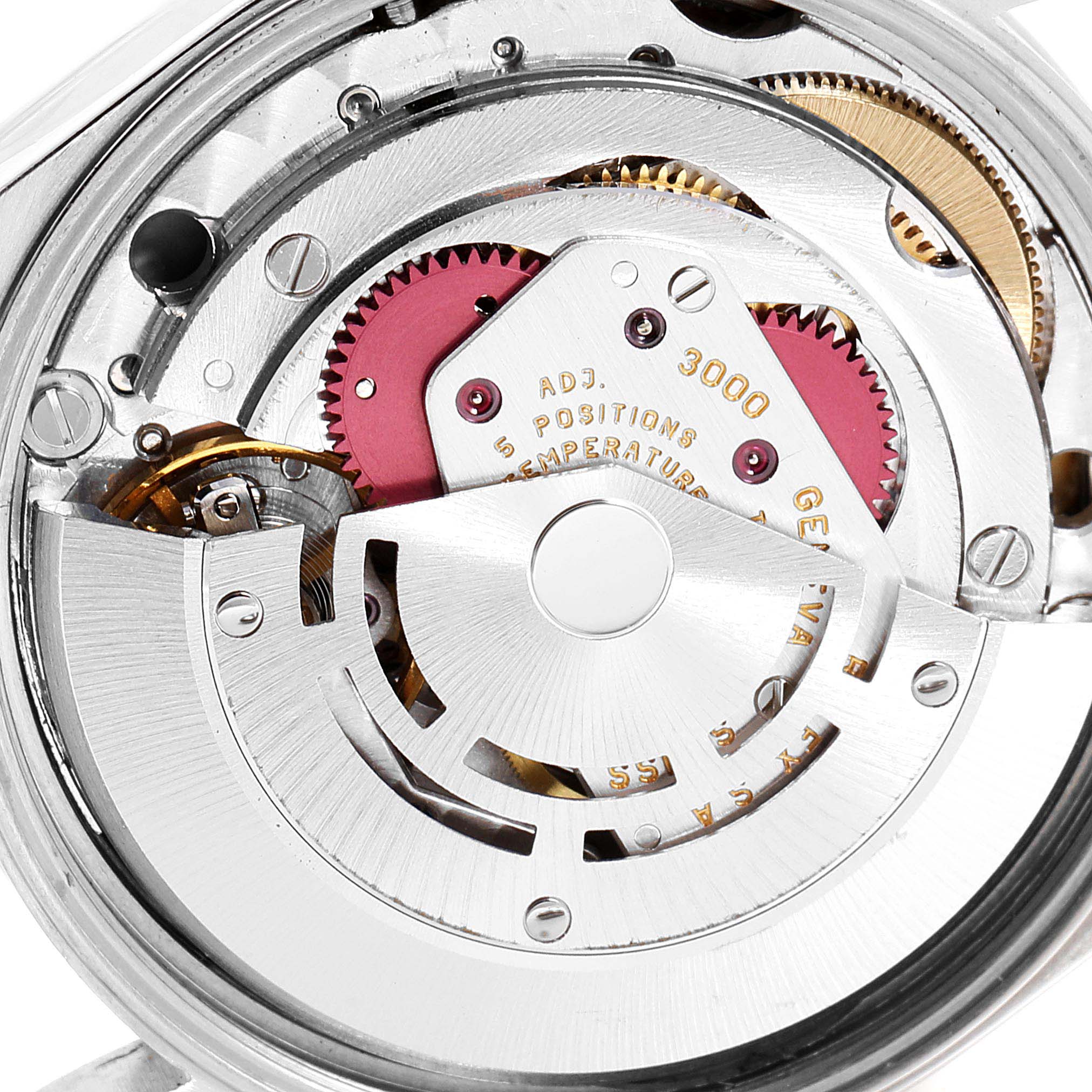 This image shows the internal mechanical movement of a Rolex Oyster Perpetual 14233 Men's Steel and Gold (two tone) Grey Dial 14233 Men's Steel and Gold (two tone) Grey Dial watch from an overhead angle.
