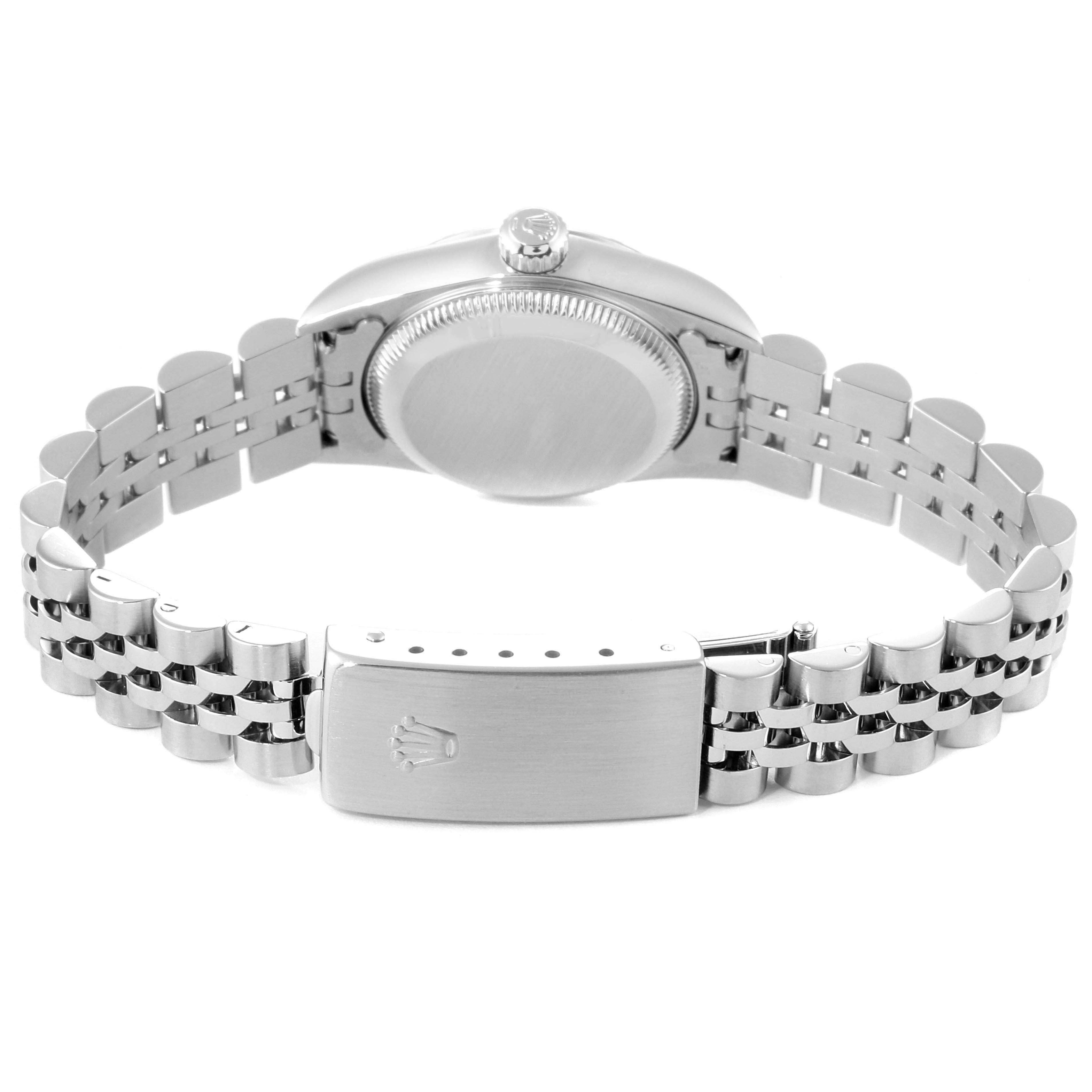 The image shows the back of the Rolex Oyster Perpetual 76030 Women
s Stainless Steel White Dial 76030 Women
s Stainless Steel White Dial watch, focusing on the clasp and bracelet.