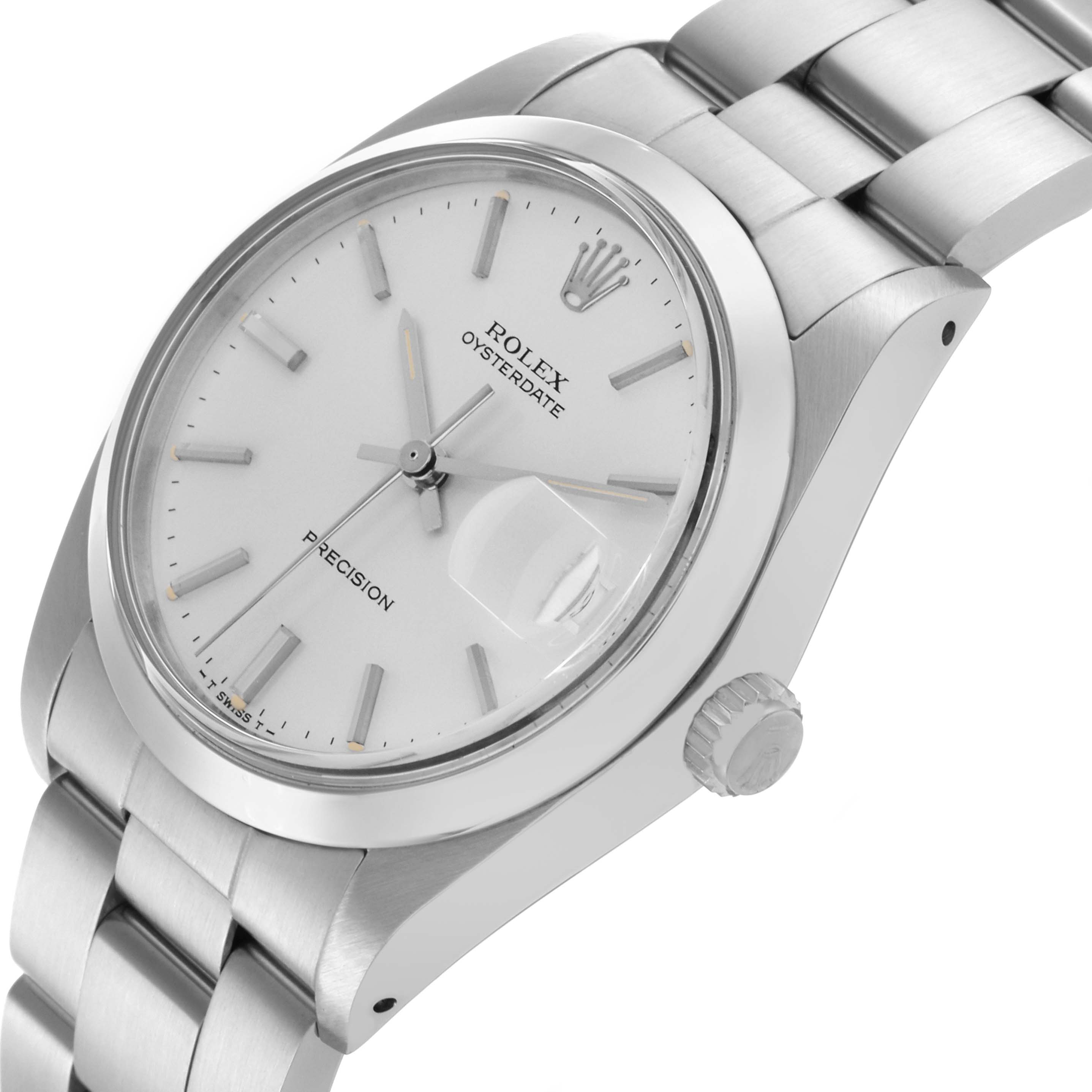 The image shows a Rolex Date 6694 Men's Stainless Steel Silver Dial 6694 Men's Stainless Steel Silver Dial model watch at a three-quarter angle, highlighting the face, bezel, crown, and part of the bracelet.