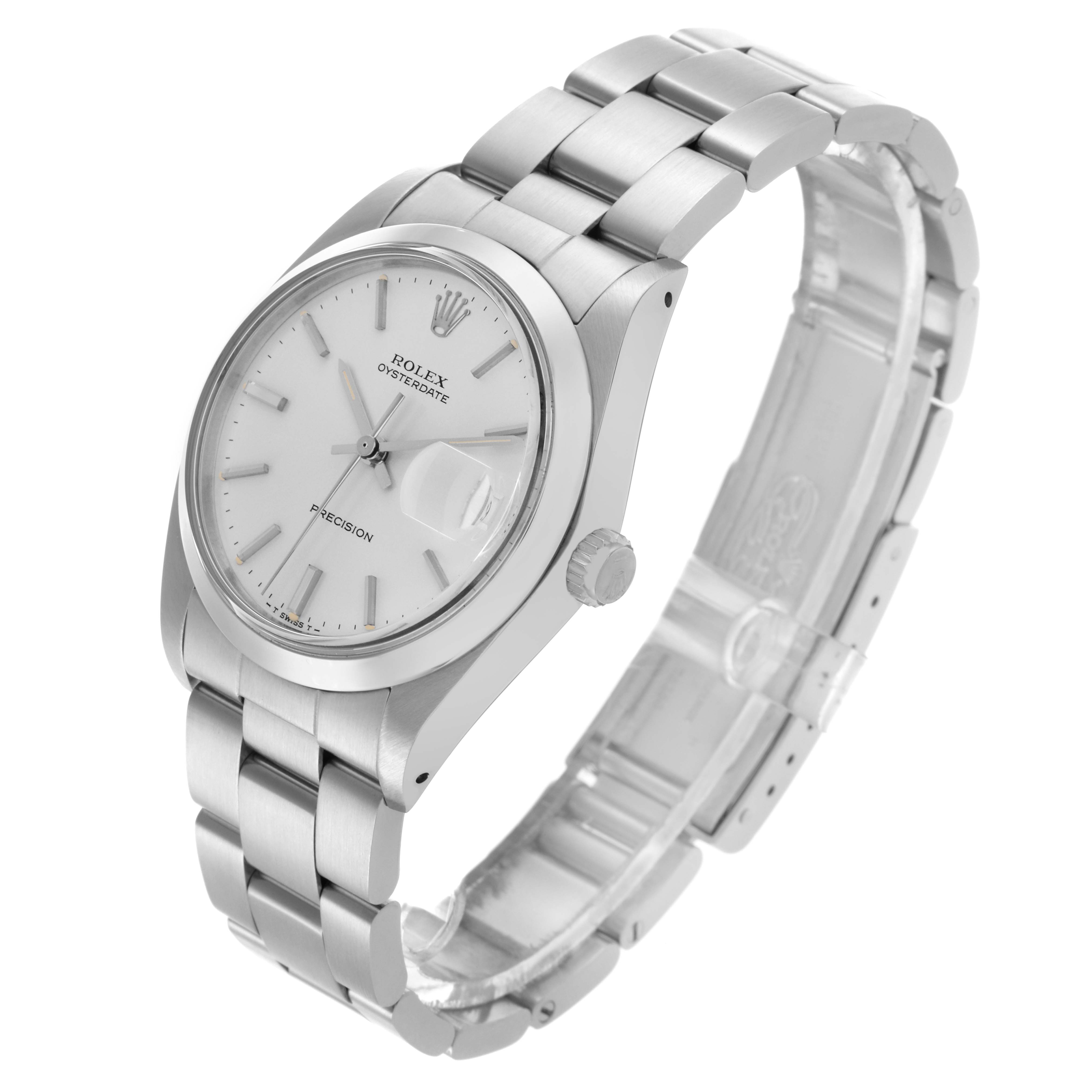 The Rolex Date 6694 Men's Stainless Steel Silver Dial 6694 Men's Stainless Steel Silver Dial watch is shown from a three-quarter angle displaying the face, bezel, crown, and bracelet.