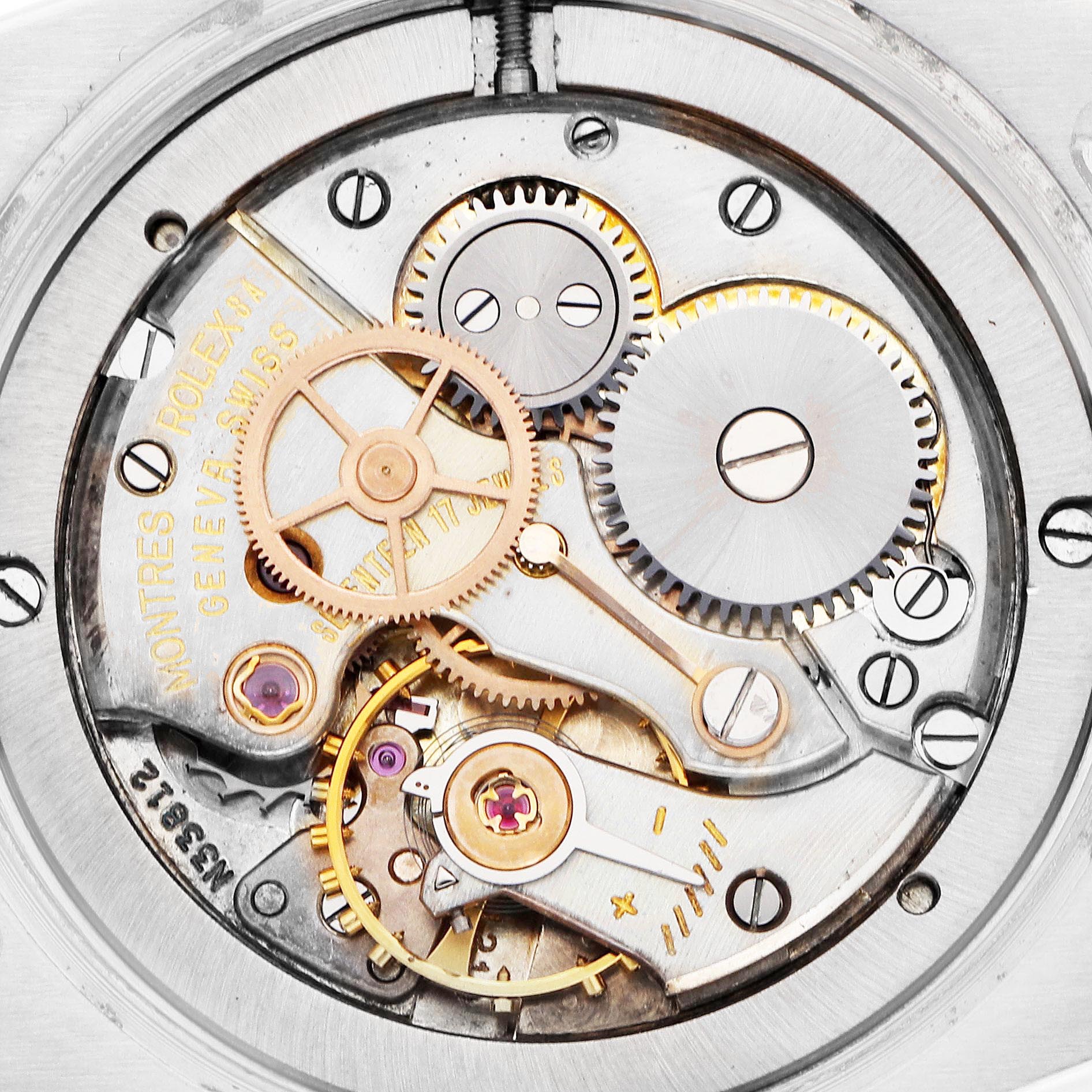 The image shows the internal mechanism of a Rolex Date 6694 Men's Stainless Steel Silver Dial 6694 Men's Stainless Steel Silver Dial model watch viewed from the back, featuring gears and movement parts.