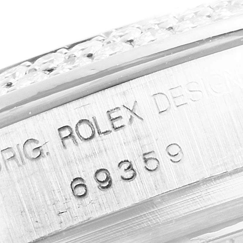 Close-up of the case side with "ROLEX DESIGN" and model number of a Rolex Pearlmaster 69359 Women's White Gold Mother of Pearl Dial 69359 Women's White Gold Mother of Pearl Dial.