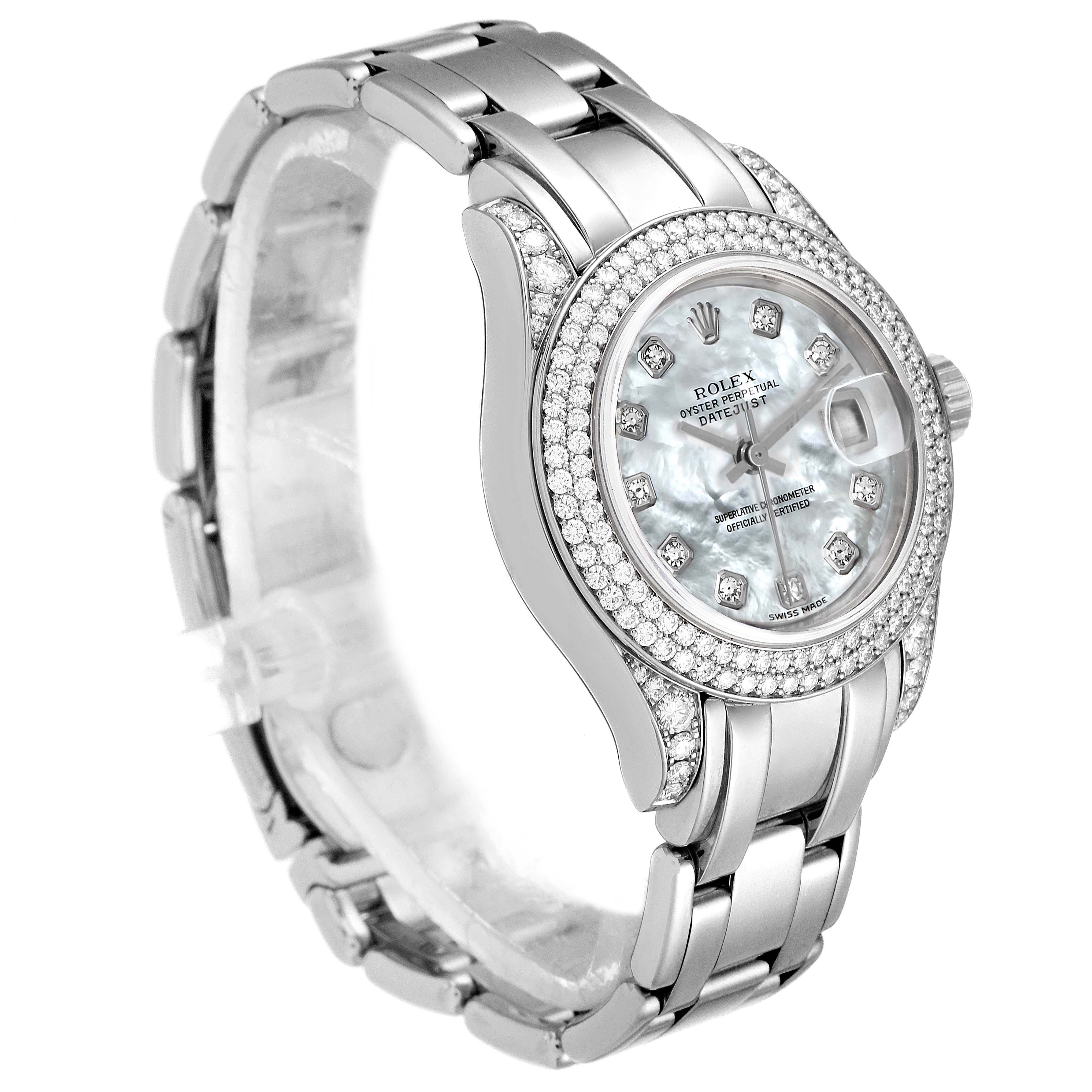 The Rolex Pearlmaster 69359 Women's White Gold Mother of Pearl Dial 69359 Women's White Gold Mother of Pearl Dial watch is shown at an oblique angle, displaying the dial, bezel, case, and part of the bracelet.