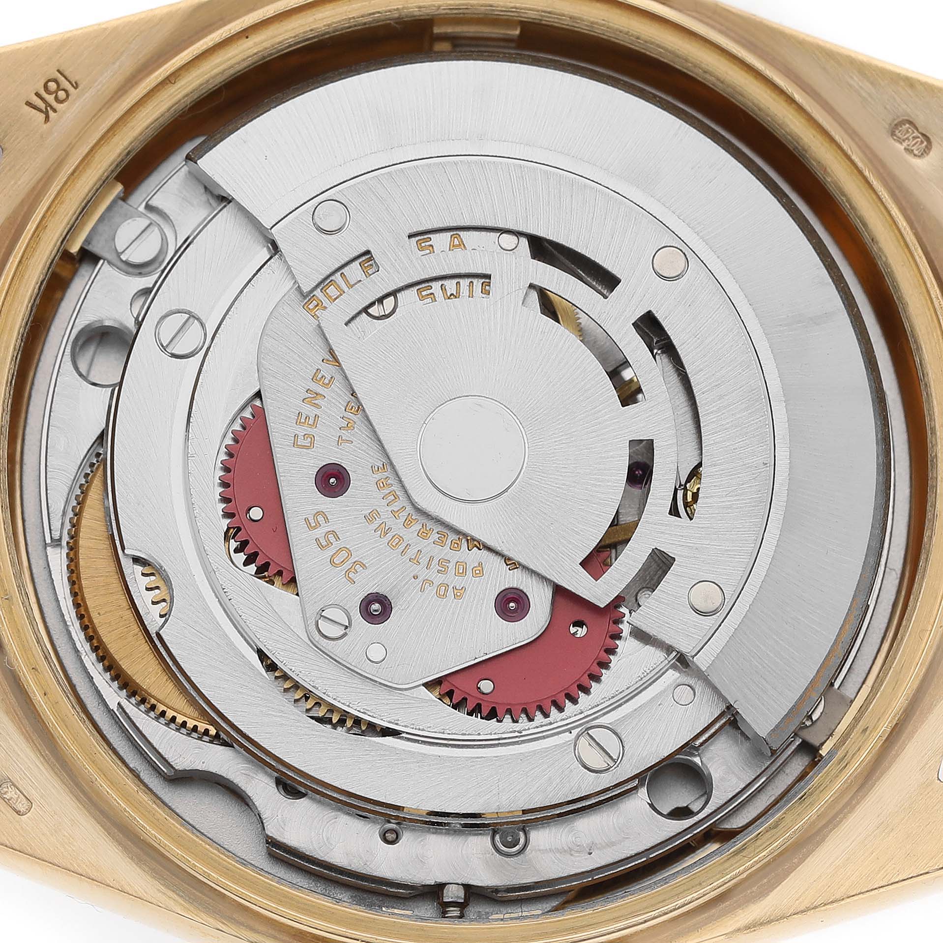 The image shows the internal movement of the Rolex President 18038 Men's Yellow Gold Champagne Dial watch model from a rear angle, highlighting its gears and rotor.
