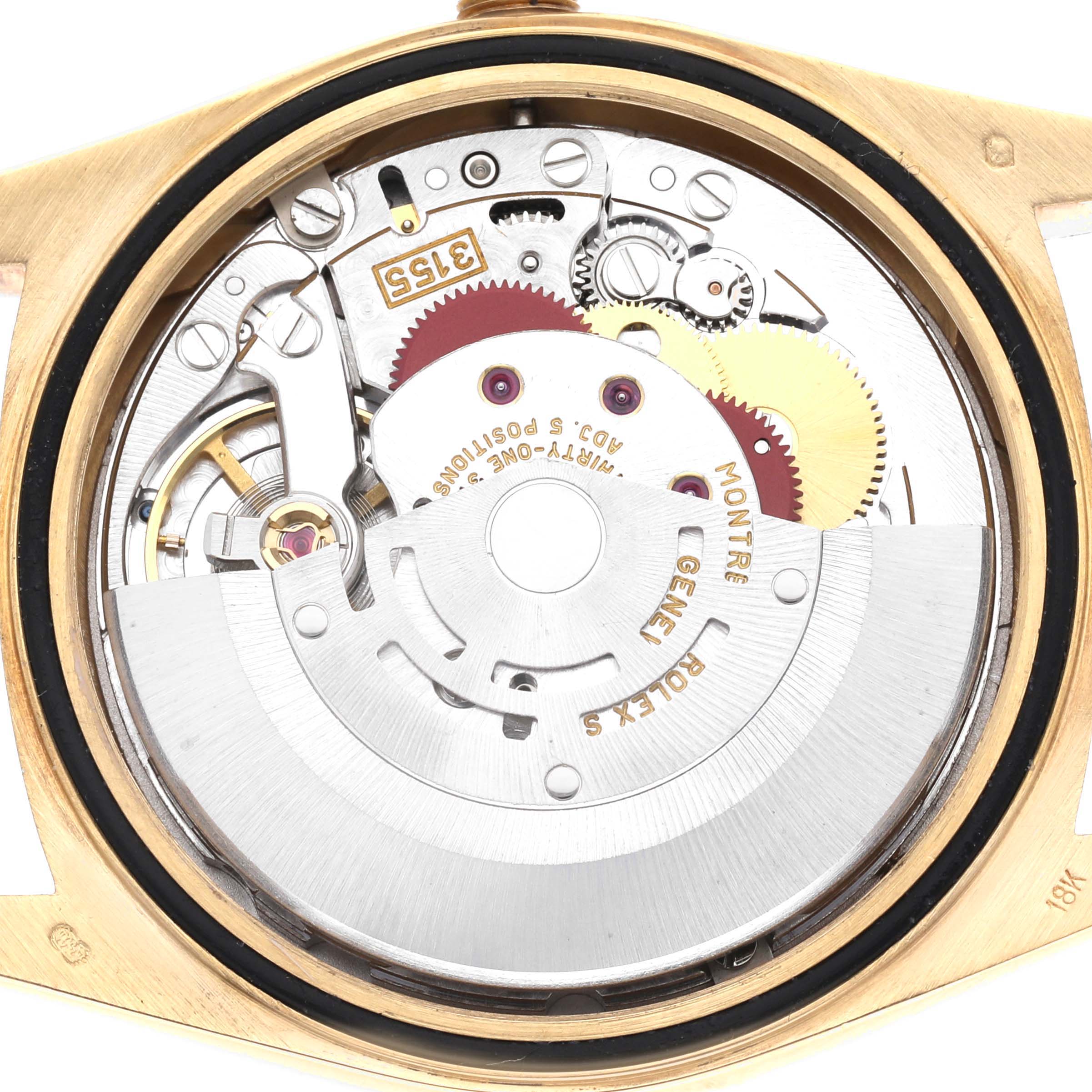 The image shows the movement mechanism of a Rolex President 18238 Men's Yellow Gold Champagne Dial 18238 Men's Yellow Gold Champagne Dial watch viewed from the back, highlighting gears and the rotor.