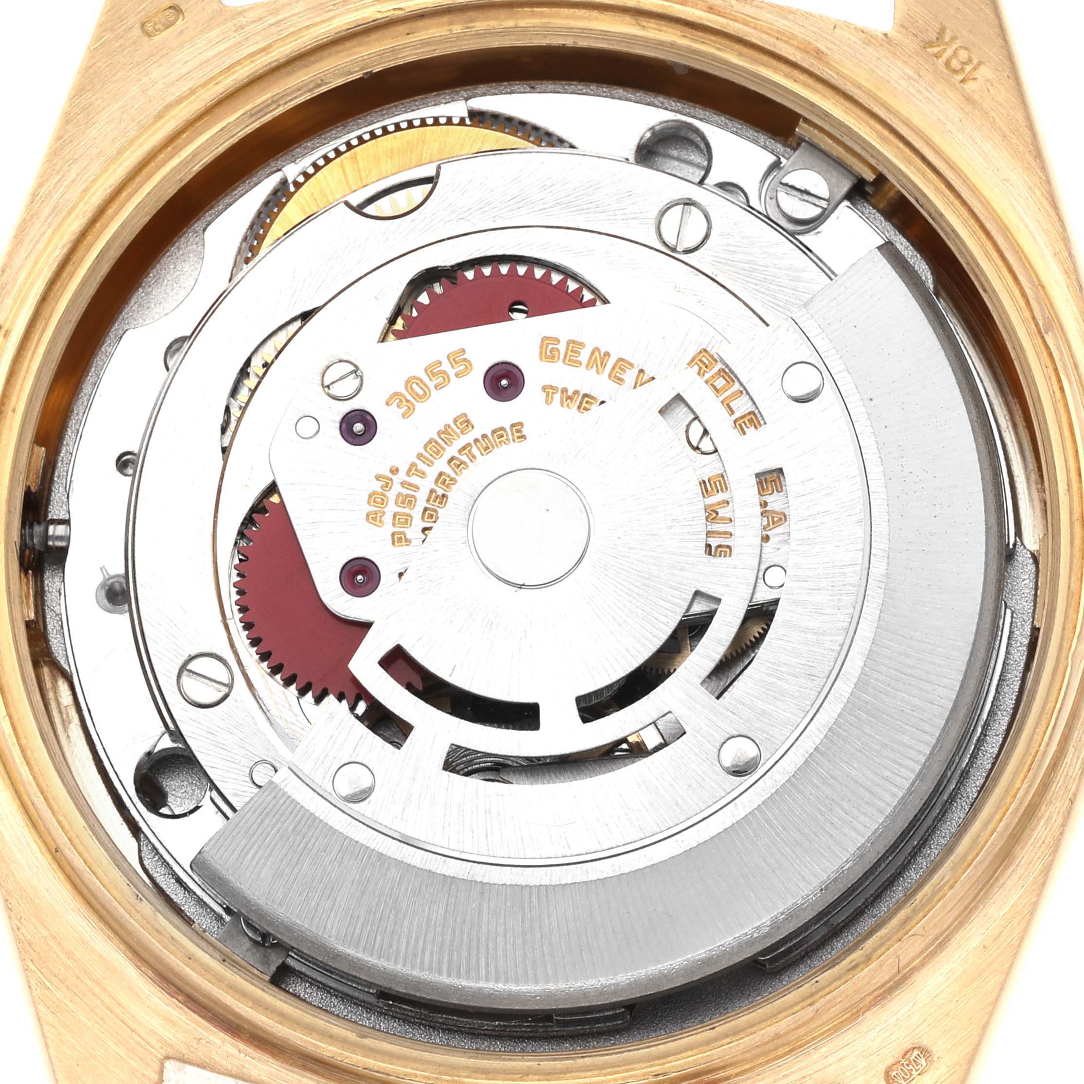 This image shows a close-up of the movement inside a Rolex President 18038 Men's Yellow Gold Champagne Dial 18038 Men's Yellow Gold Champagne Dial watch, highlighting the intricate mechanical parts.