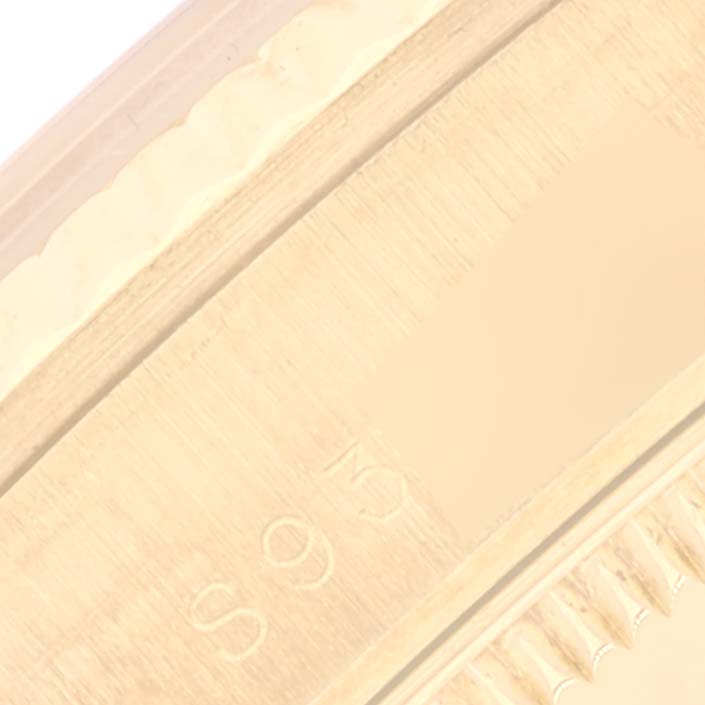 This close-up image shows the side view of the bezel and case of the Rolex President 68278 Women's Yellow Gold Mother of Pearl Dial 68278 Women's Yellow Gold Mother of Pearl Dial model watch.
