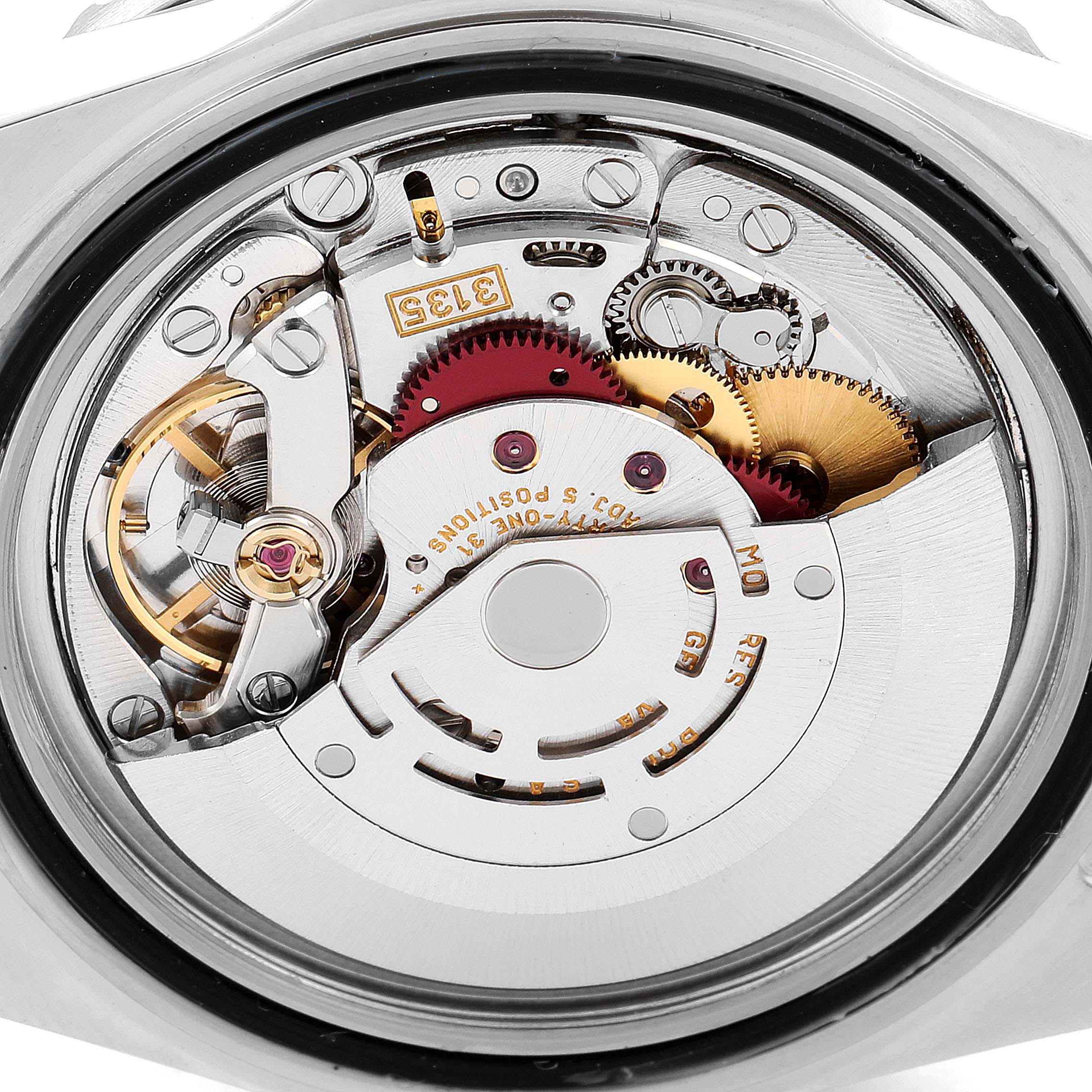 The image shows the internal mechanism of a Rolex Submariner 16610 Men
s Stainless Steel Black Dial 16610 Men
s Stainless Steel Black Dial model, viewed from the caseback.
