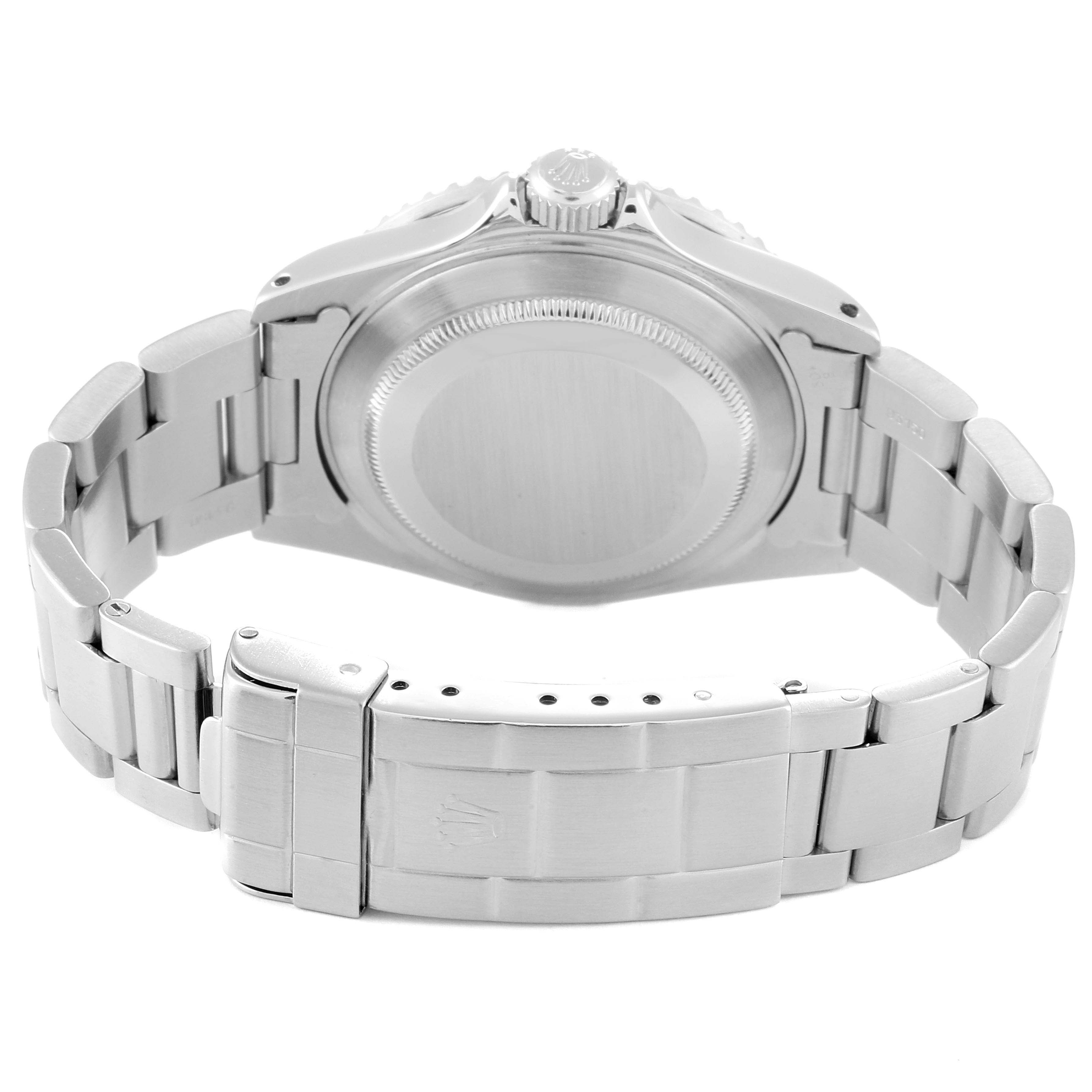 The image shows the back and bracelet of a Rolex Submariner 16610 Men
s Stainless Steel Black Dial 16610 Men
s Stainless Steel Black Dial watch from a rear angle.