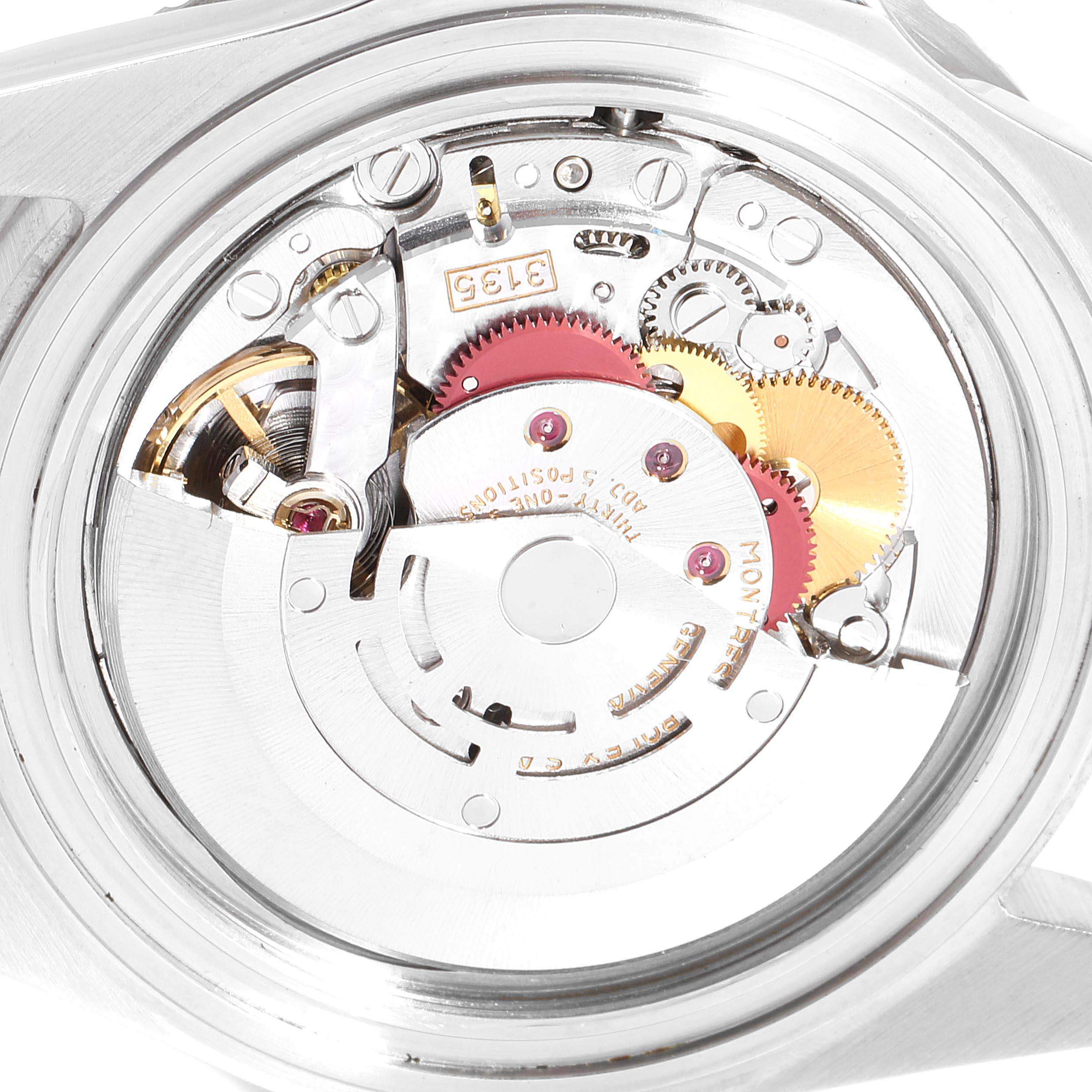 This is a close-up view of the internal movement mechanism of a Rolex Submariner 16610 Men
s Stainless Steel Black Dial 16610 Men
s Stainless Steel Black Dial watch.