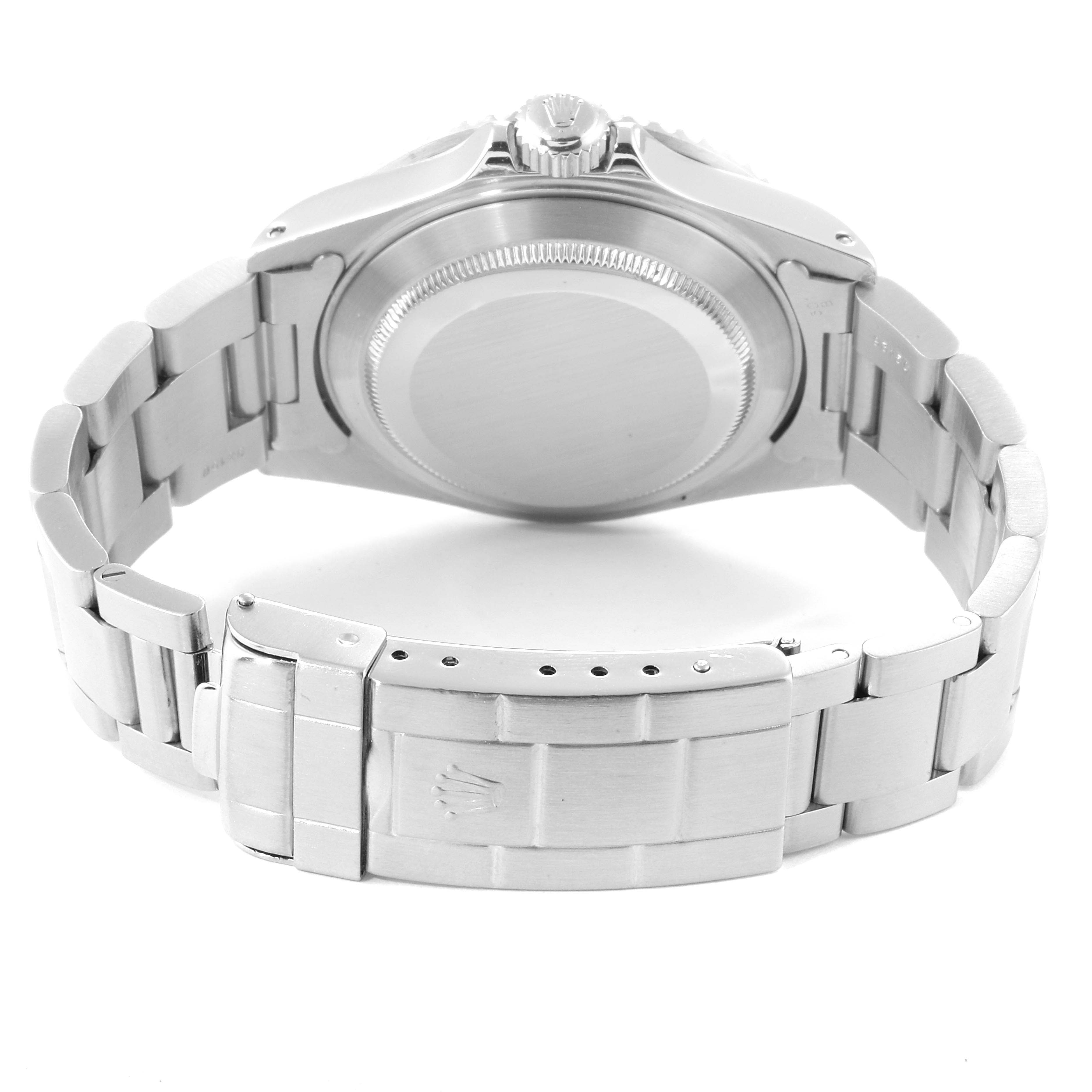 This image shows the back of the Rolex Submariner 16610 Men
s Stainless Steel Black Dial 16610 Men
s Stainless Steel Black Dial watch, highlighting the case back and metal bracelet.