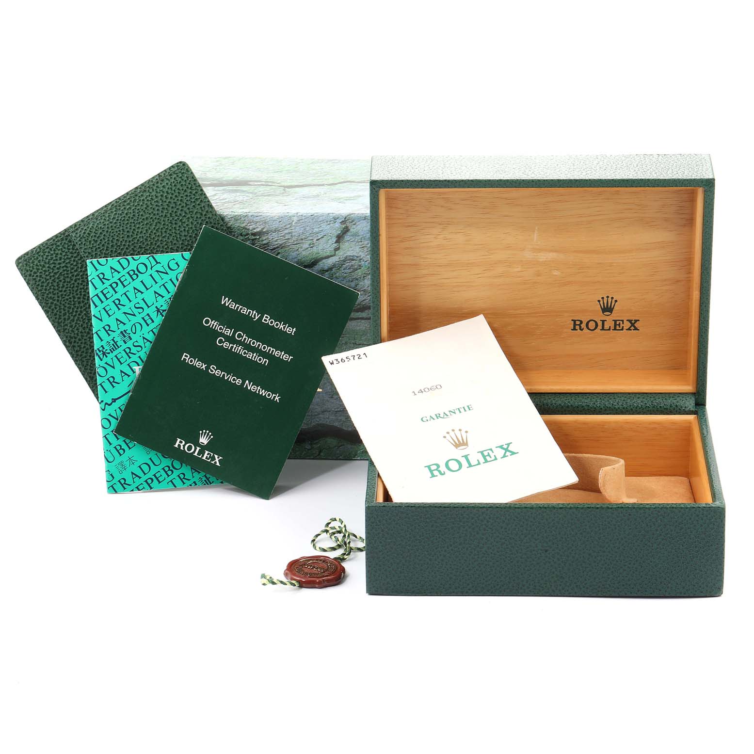 The image shows the packaging and documentation for a Rolex Submariner 14060 Men
s Stainless Steel Black Dial 14060 Men
s Stainless Steel Black Dial, including the box, warranty booklet, and guarantee certificate.