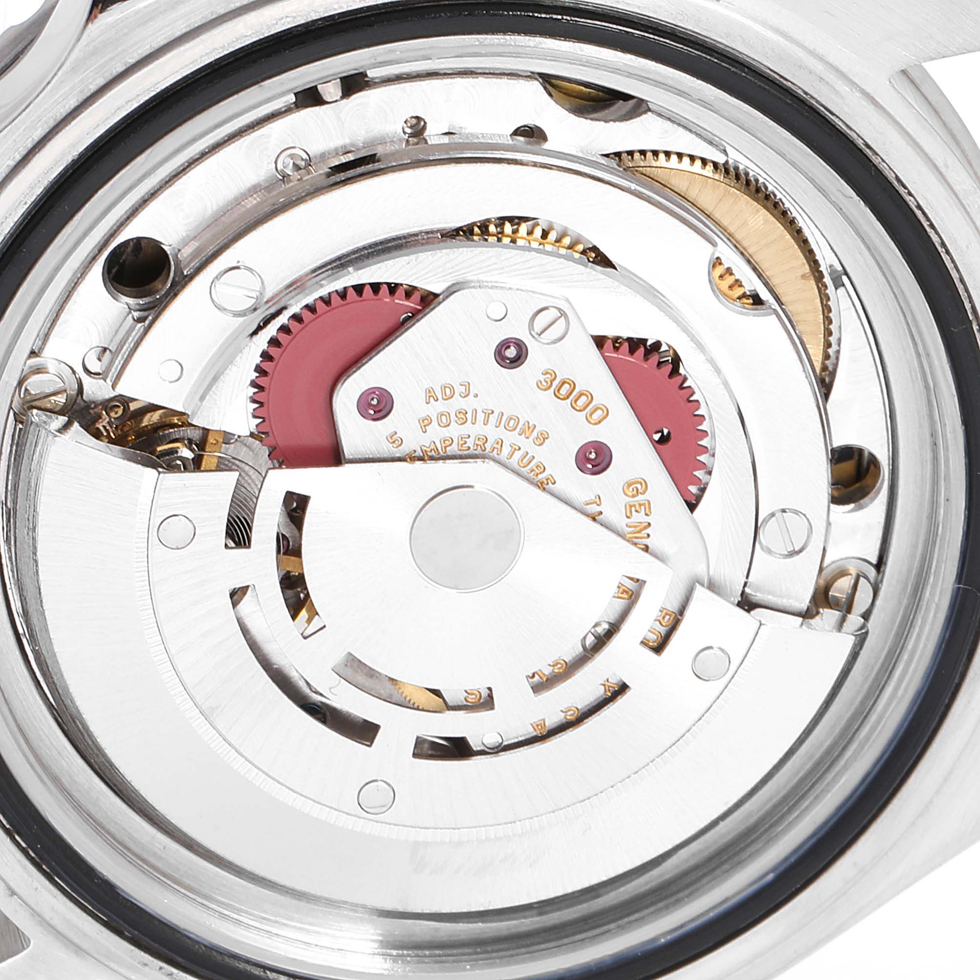 The image shows the intricate internal mechanism of the Rolex Submariner 14060 Men
s Stainless Steel Black Dial 14060 Men
s Stainless Steel Black Dial watch, focusing on its movement components.