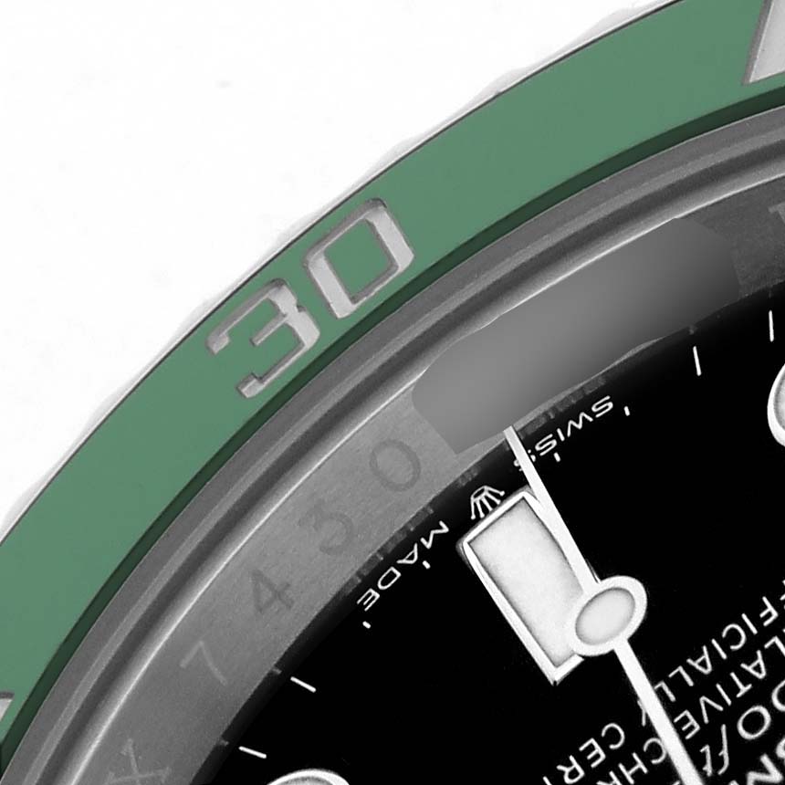 The image shows a close-up of the Rolex Submariner 126610LV Men's Stainless Steel Black Dial bezel and a portion of the watch dial, focusing on the minute markings.