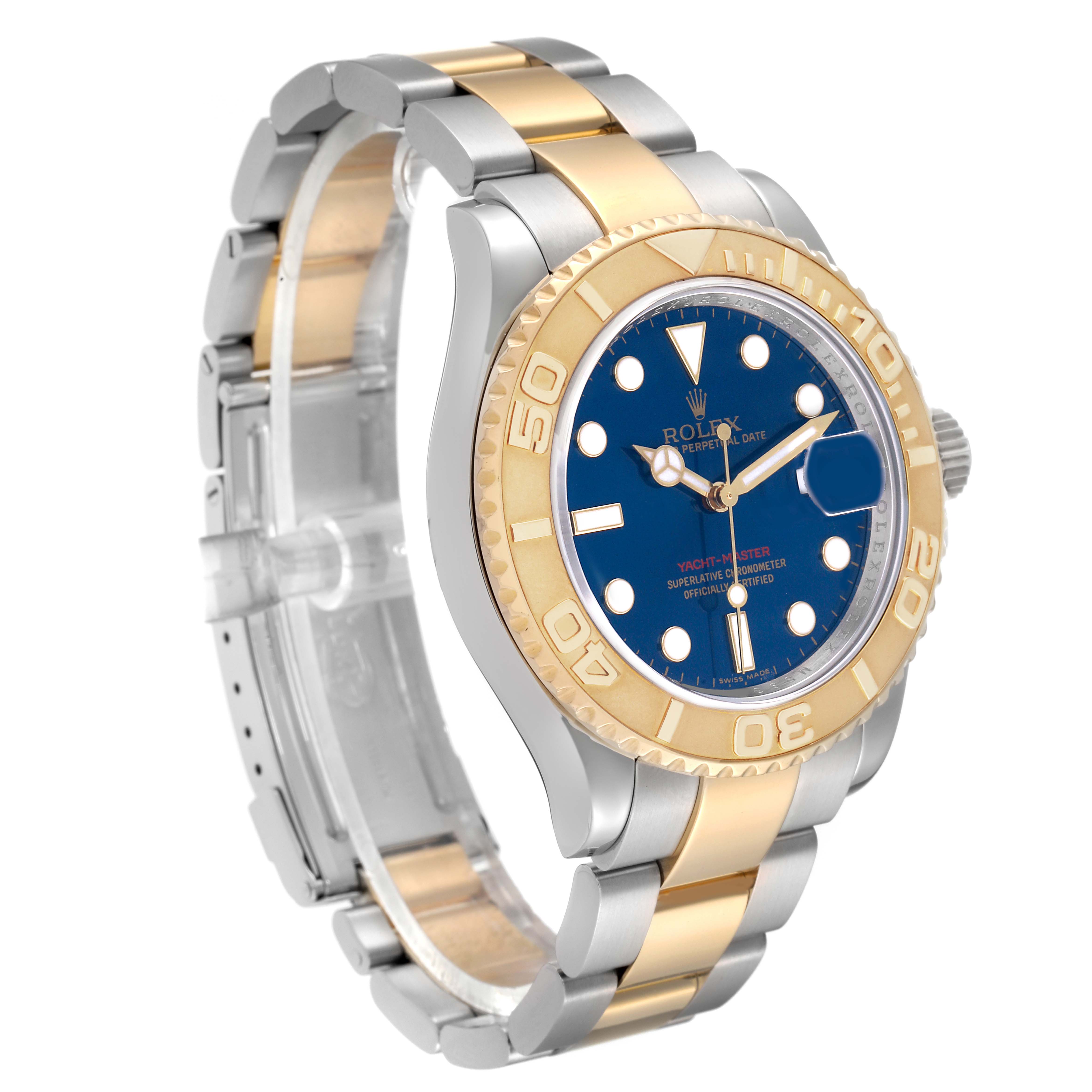 The image shows a Rolex Yacht-Master 16623 Men's Steel and Gold (two tone) Blue Dial watch in a three-quarter angle, highlighting the bezel, dial, and two-tone bracelet.