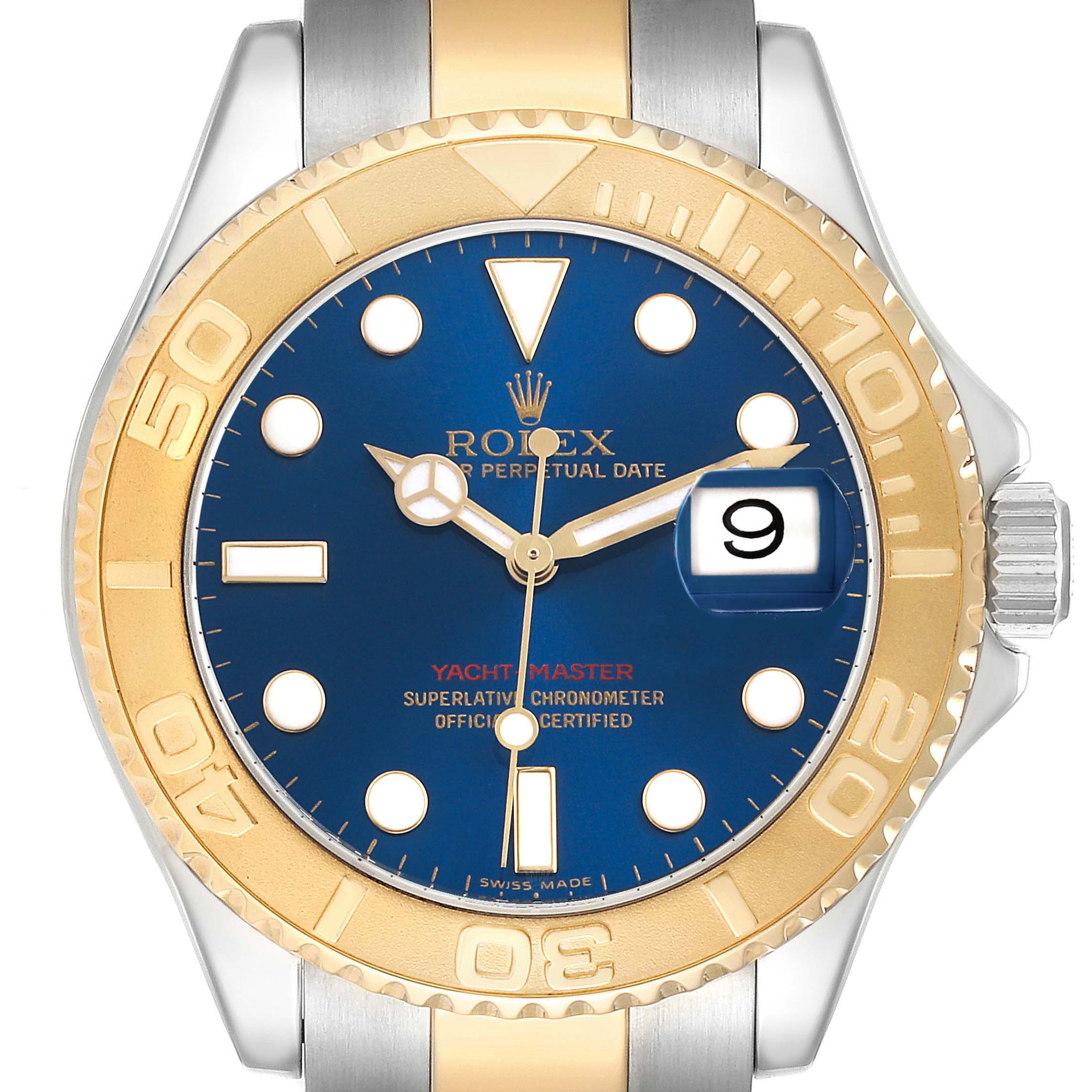 The Rolex Yacht-Master 16623 Men's Steel and Gold (two tone) Blue Dial watch is shown from a front angle, highlighting the blue dial, gold bezel, hands, and date window.