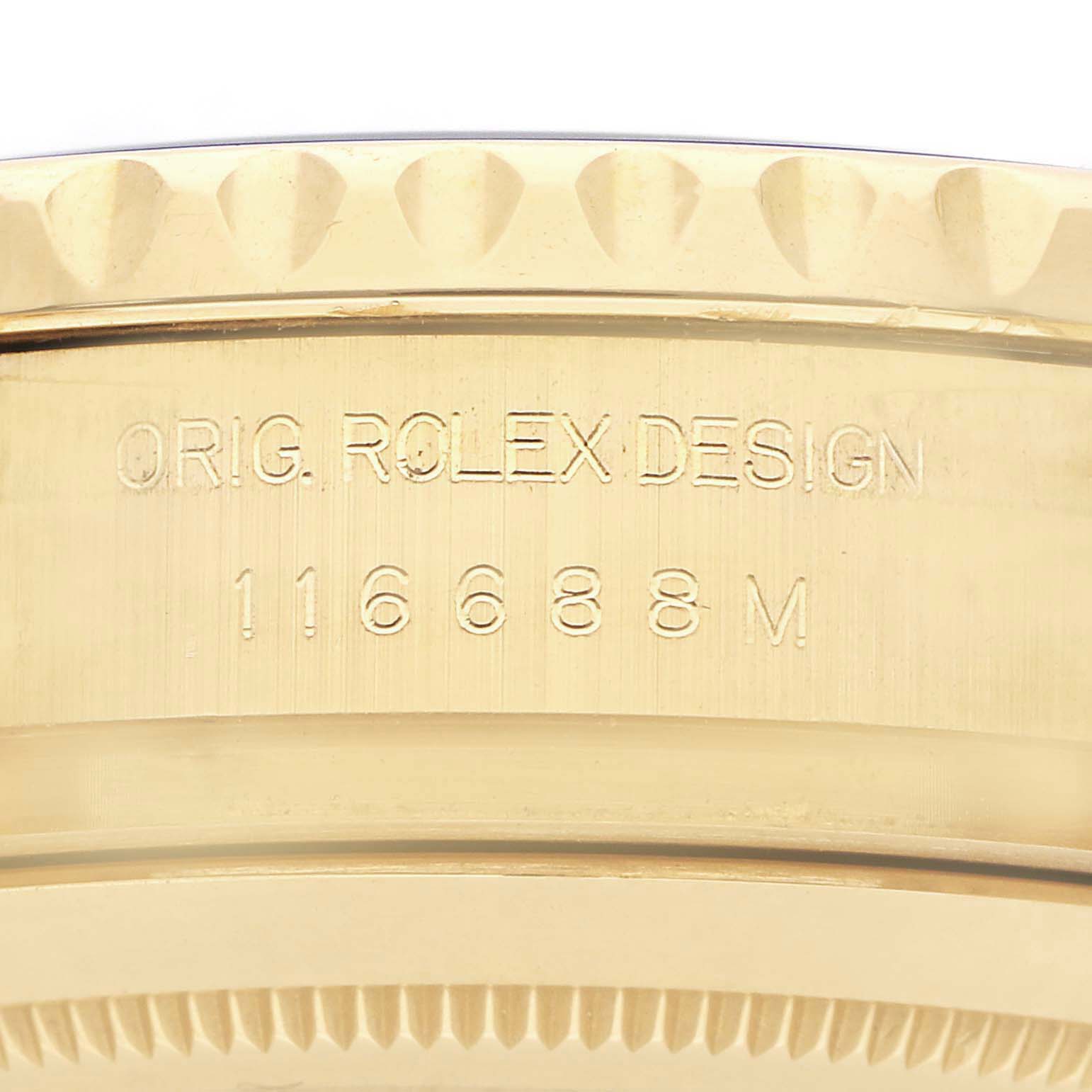 The image shows a close-up of the side of the Rolex Yacht-Master 116688 Men's Yellow Gold White Dial 116688 Men's Yellow Gold White Dial, highlighting the engraved model number and design text.