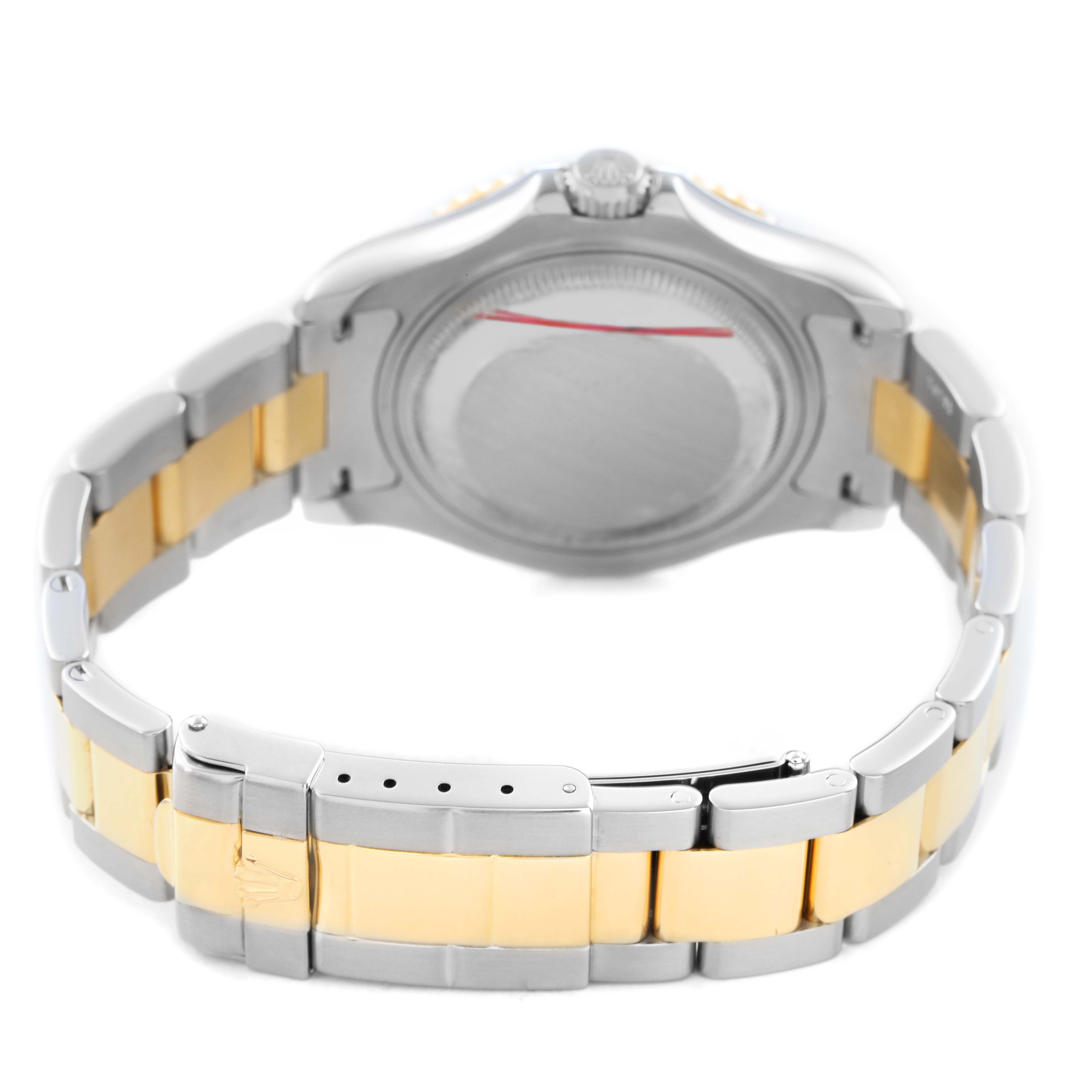 The image shows the back view of a Rolex Yacht-Master 68623 Men's Steel and Gold (two tone) Blue Dial, highlighting the clasp and two-tone bracelet.