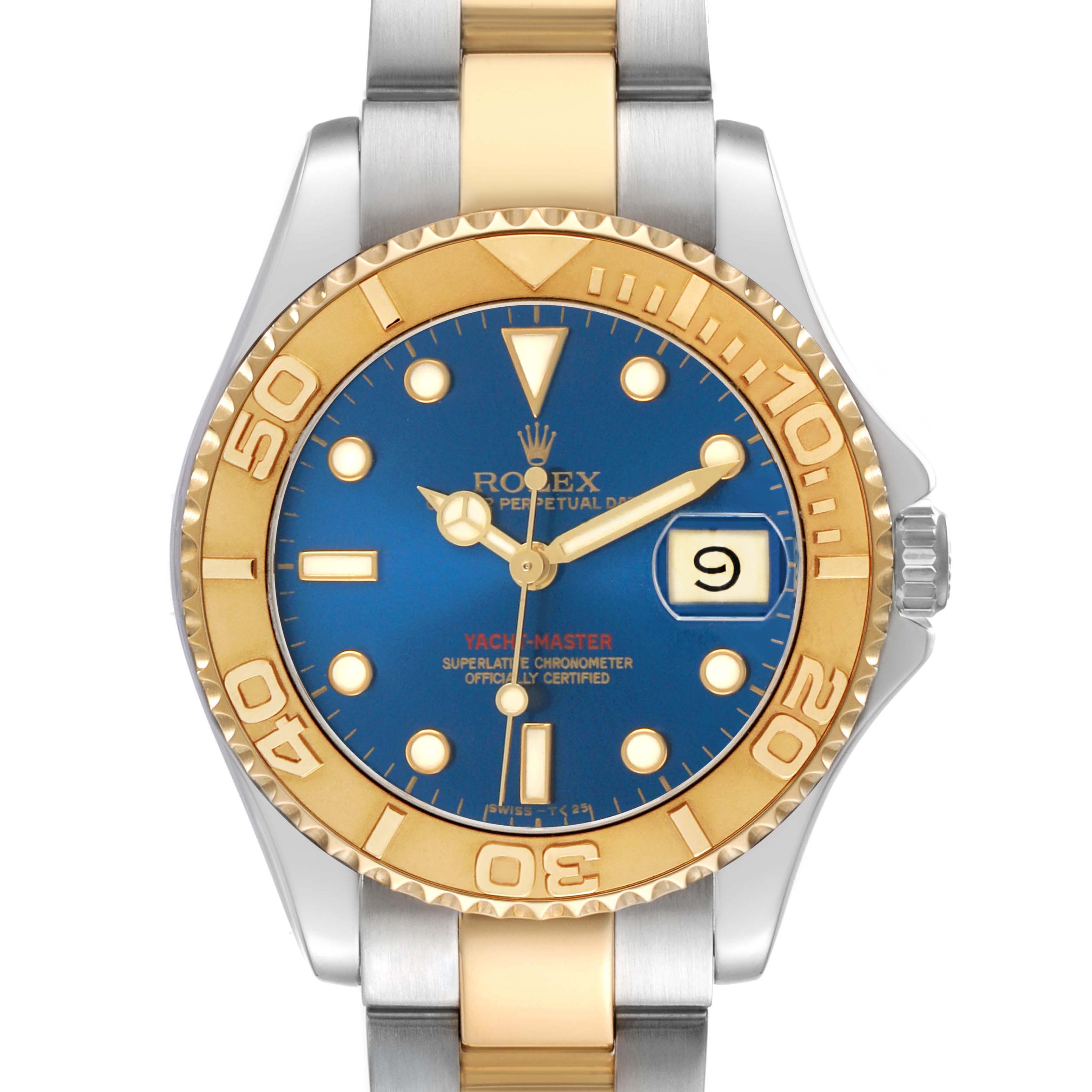 The Rolex Yacht-Master 68623 Men's Steel and Gold (two tone) Blue Dial watch is shown from a front angle, featuring its gold and stainless steel bracelet, blue dial, and gold bezel.