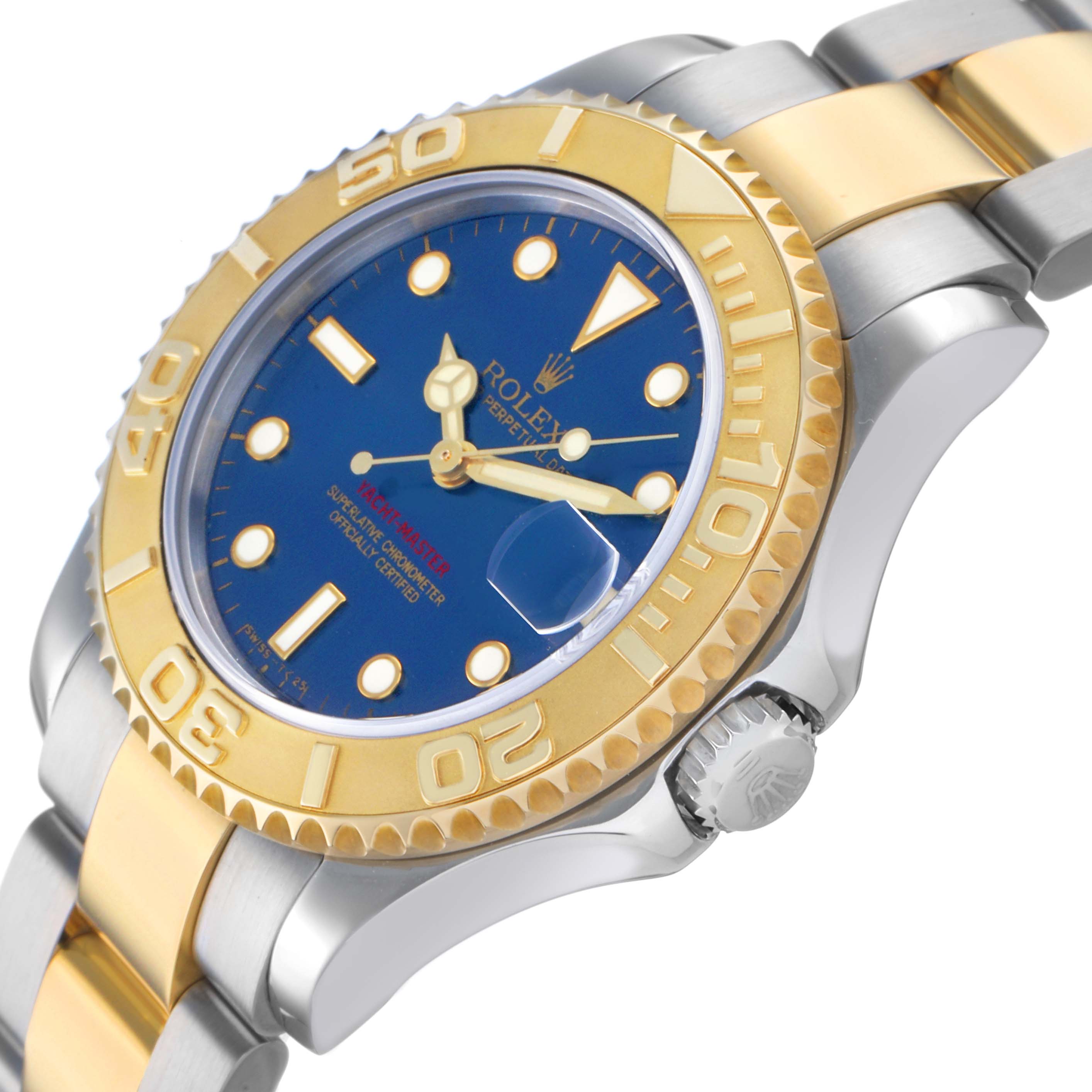 The Rolex Yacht-Master 68623 Men's Steel and Gold (two tone) Blue Dial watch is shown at a side angle highlighting its gold bezel, blue dial, and two-tone bracelet.