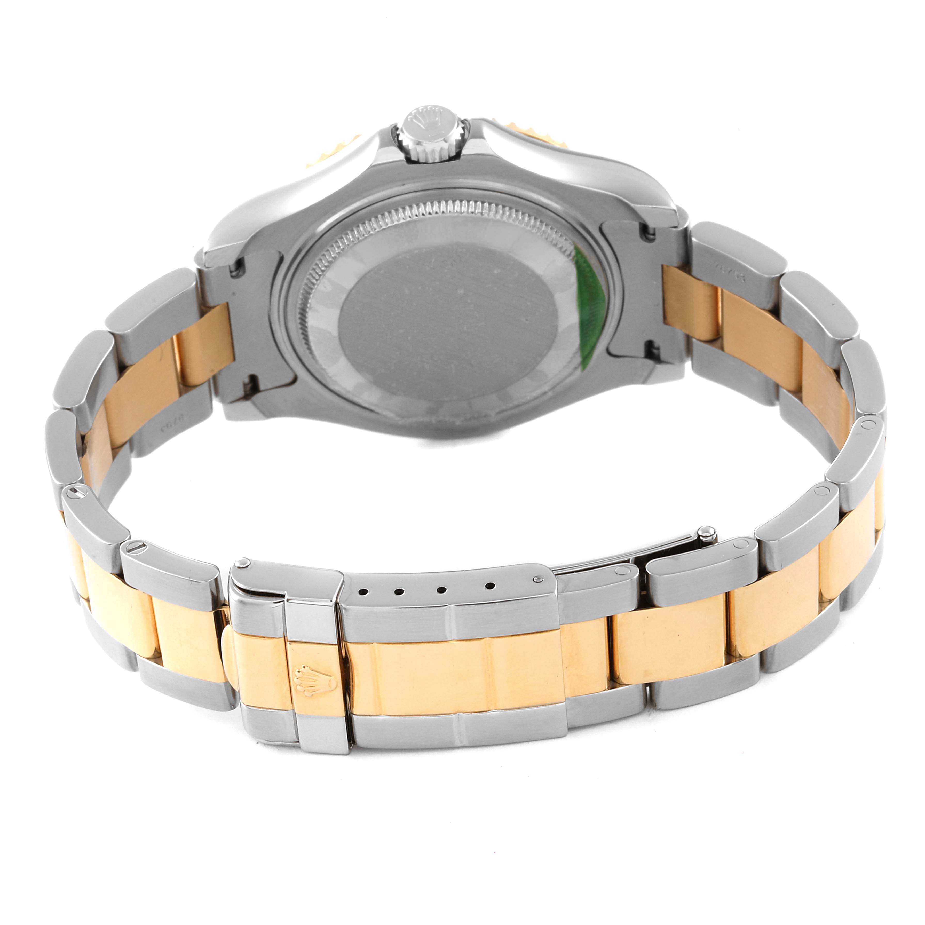 The image shows the back case and bracelet of a Rolex Yacht-Master 168623 Men's Steel and Gold (two tone) Blue Dial 168623 Men's Steel and Gold (two tone) Blue Dial watch from an angle highlighting the clasp and links.