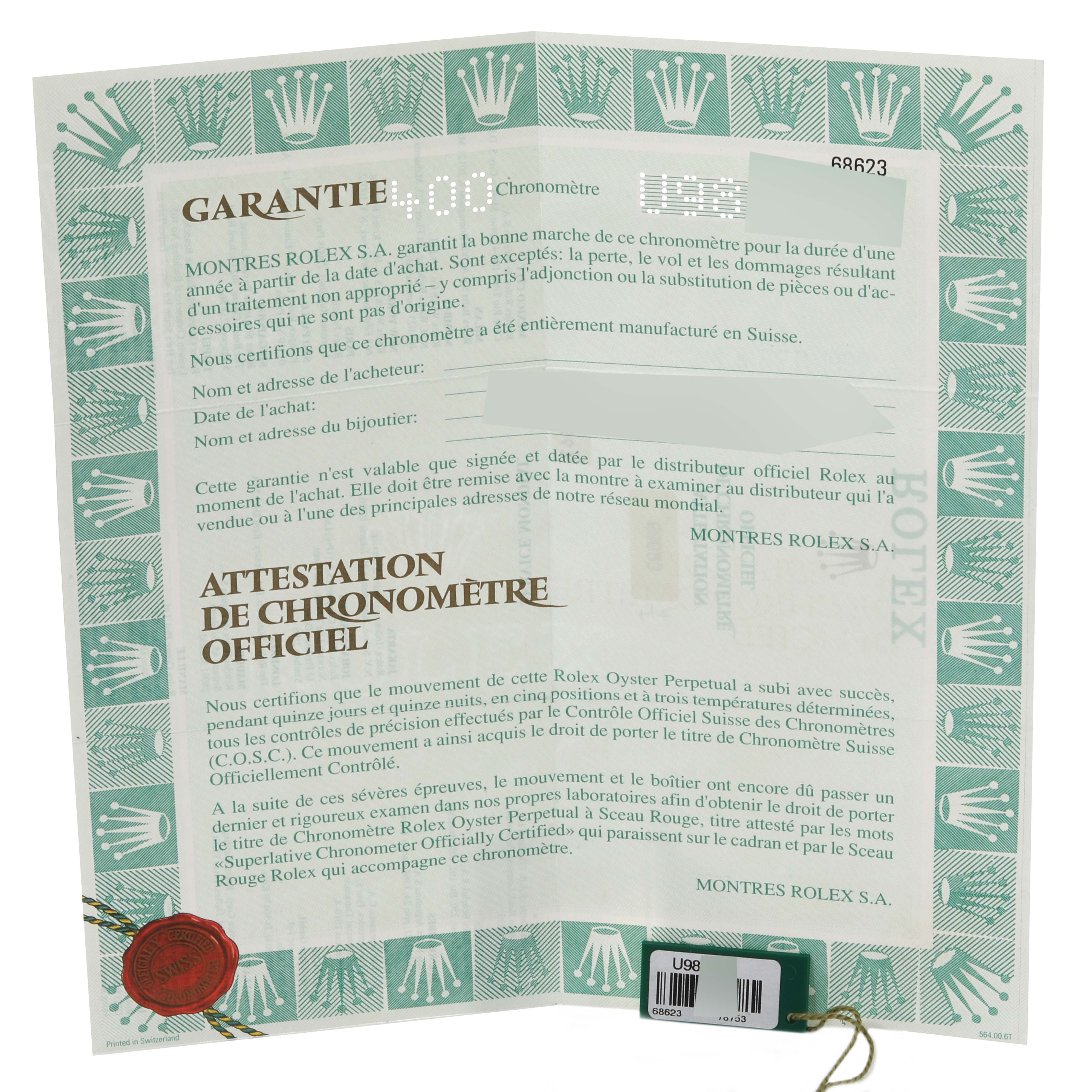 The image shows a Rolex Yacht-Master 168623 Men's Steel and Gold (two tone) Blue Dial 168623 Men's Steel and Gold (two tone) Blue Dial guarantee and official chronometer certification documents, photographed at a front angle.