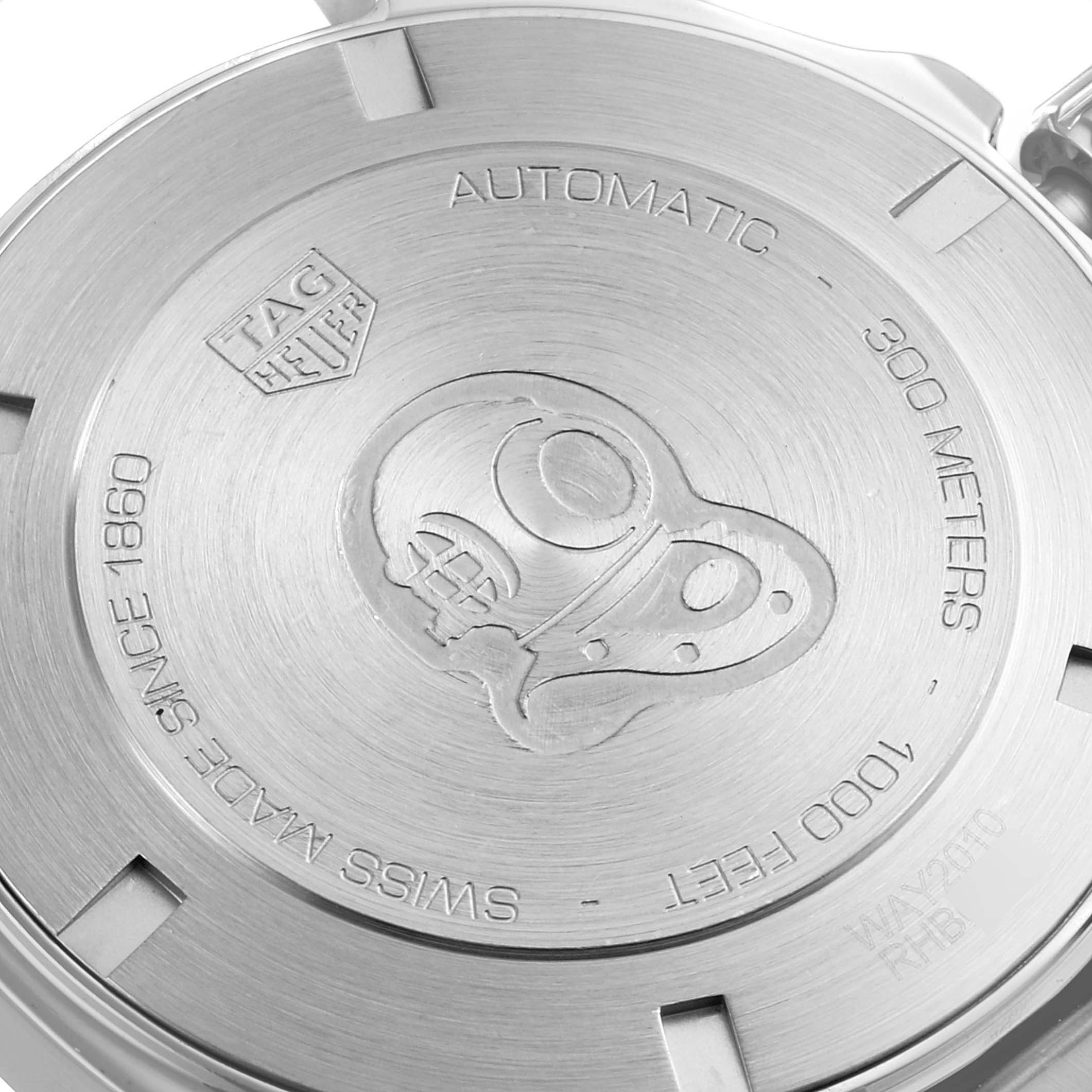 This image shows the case back of an Aquaracer model watch by Tag Heuer, including engravings and the brand logo.