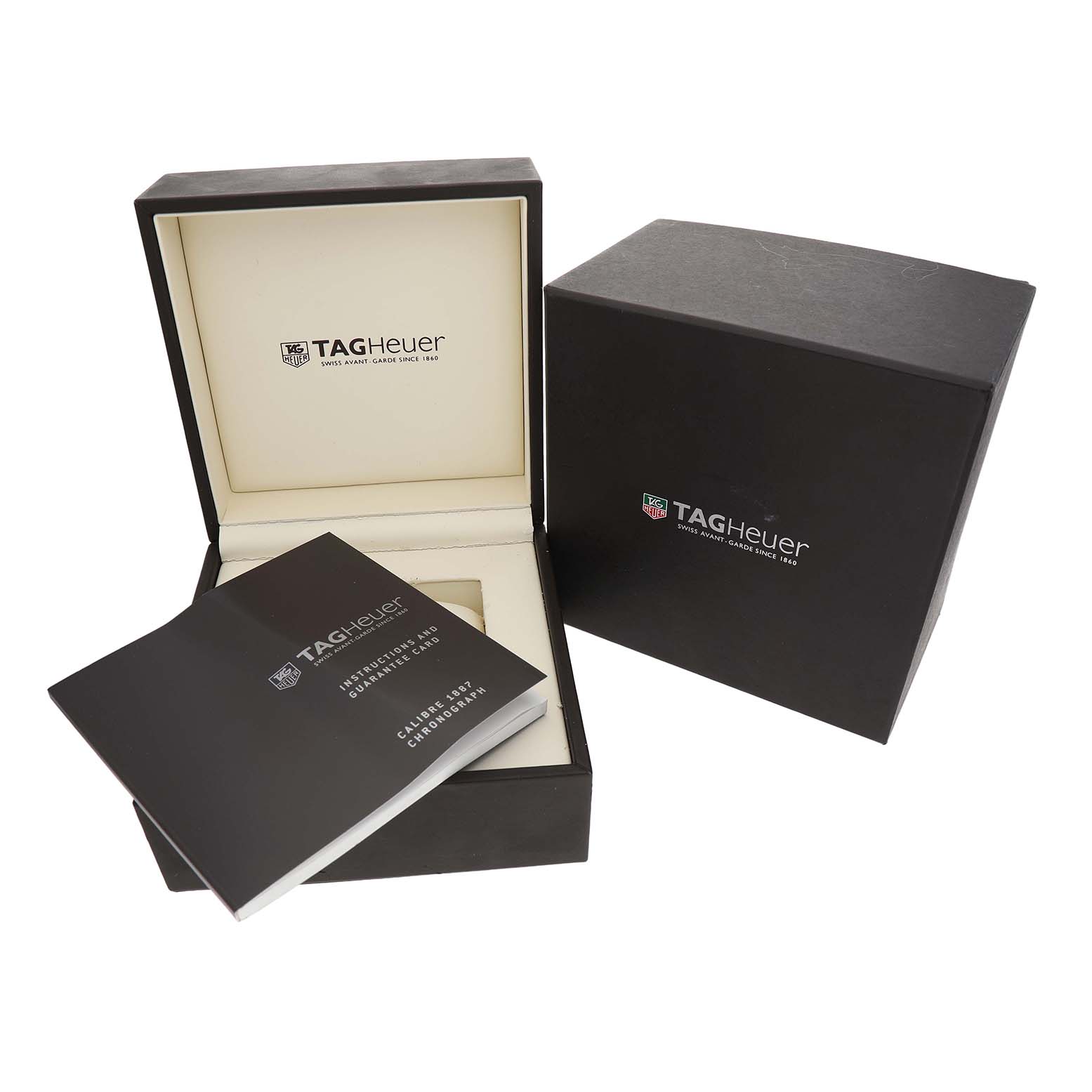 The image shows the Tag Heuer Carrera CAR2111-3 Men's Stainless Steel Silver Dial watch box, lid open, with a manual and a warranty card visible.