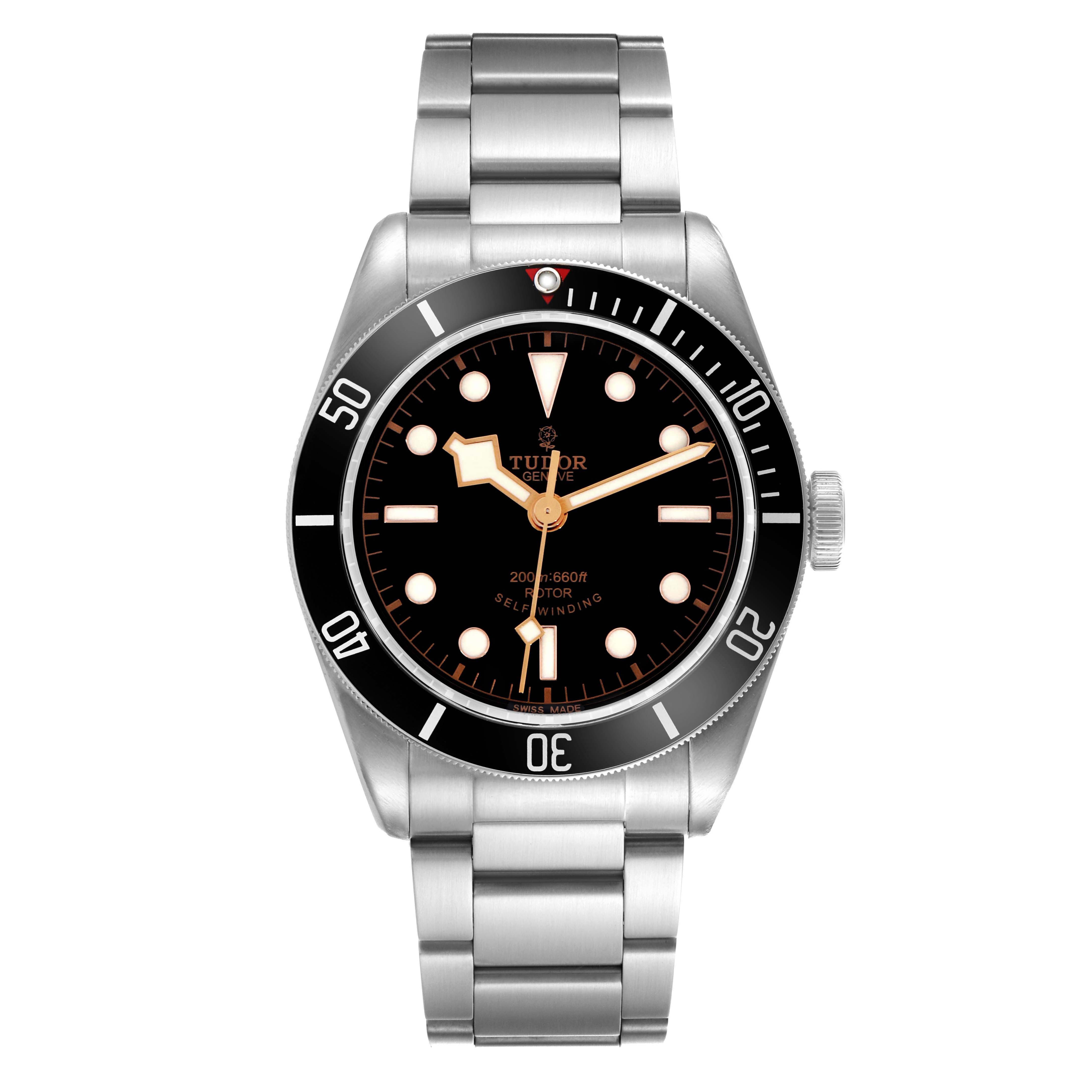 The image shows a front view of the Tudor Heritage Black Bay 79220N Men's Stainless Steel Black Dial 79220N Men's Stainless Steel Black Dial watch, highlighting its dial, bezel, and bracelet.