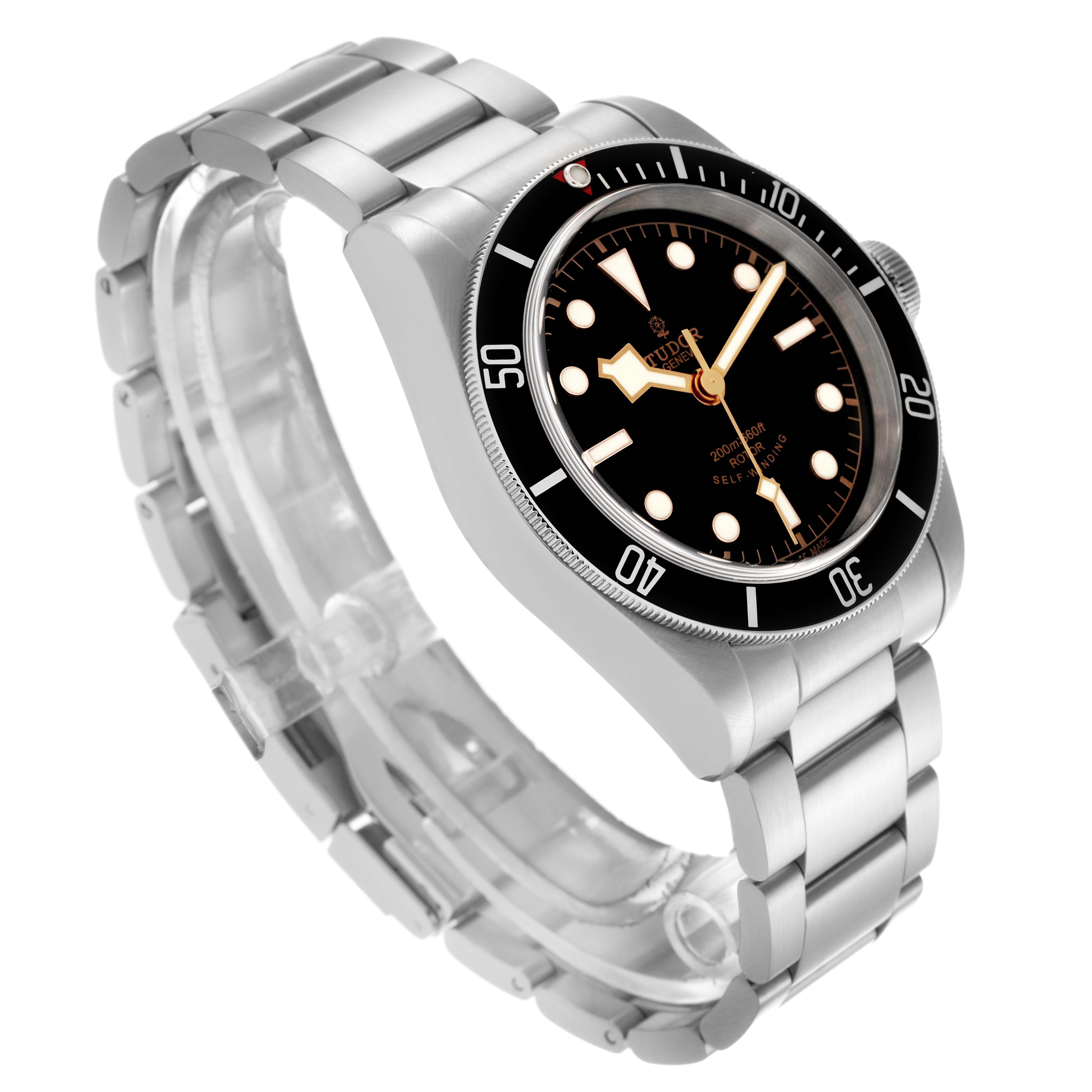 The Tudor Heritage Black Bay 79220N Men's Stainless Steel Black Dial 79220N Men's Stainless Steel Black Dial watch is shown at a slight angle, displaying its black dial, bezel, and stainless steel bracelet.