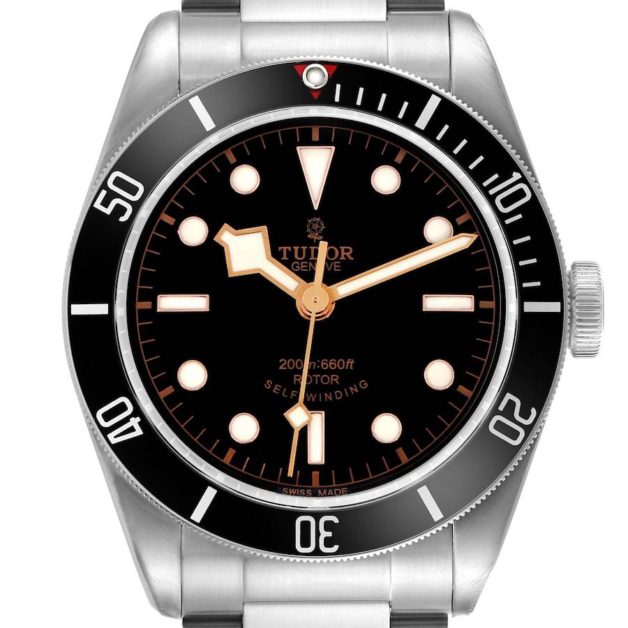 The Tudor Heritage Black Bay watch is shown from the front, highlighting the dial, bezel, hands, and crown.