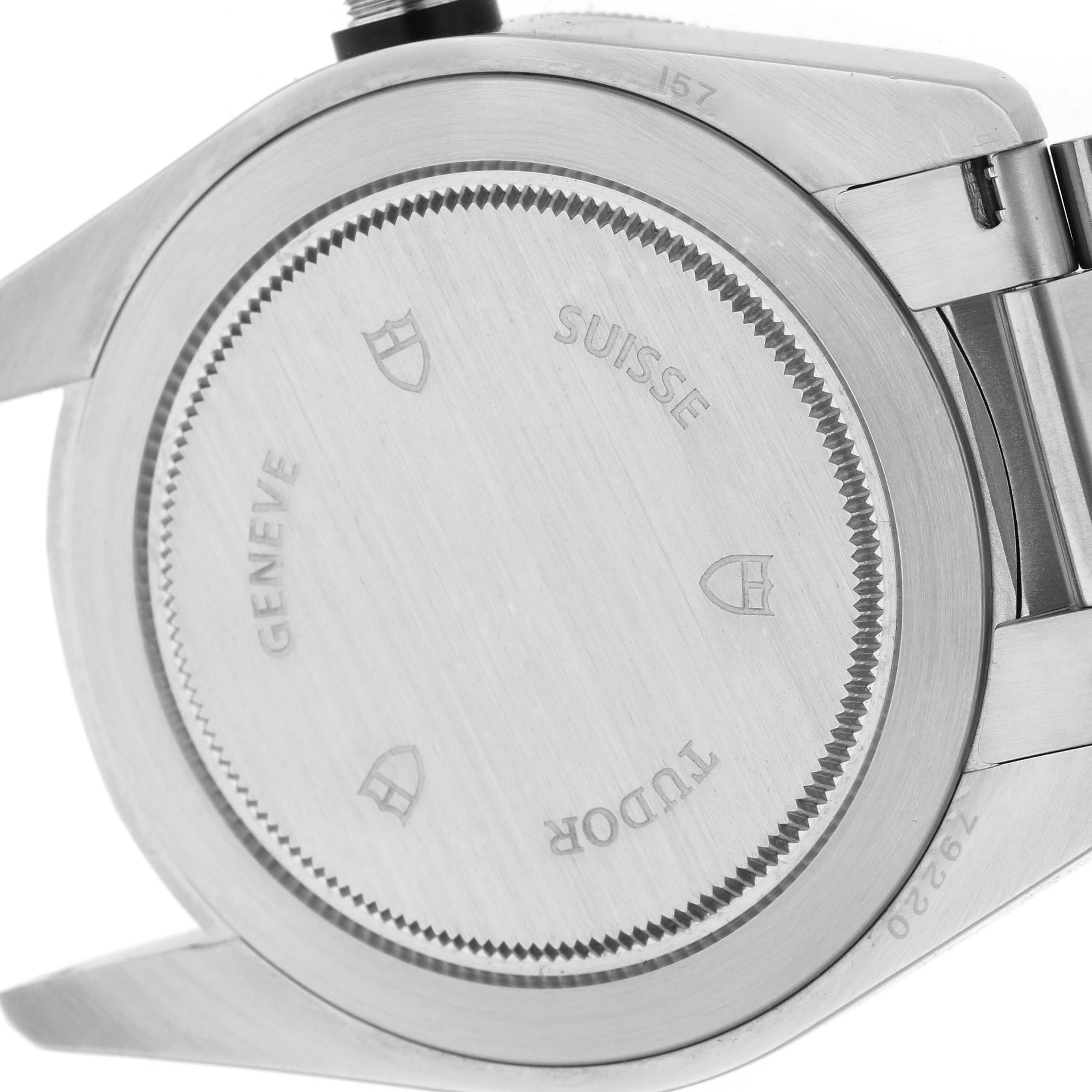 The image shows the back case and part of the bracelet of a Tudor Heritage Black Bay 79220N Men's Stainless Steel Black Dial 79220N Men's Stainless Steel Black Dial watch, viewed from a rear angle.