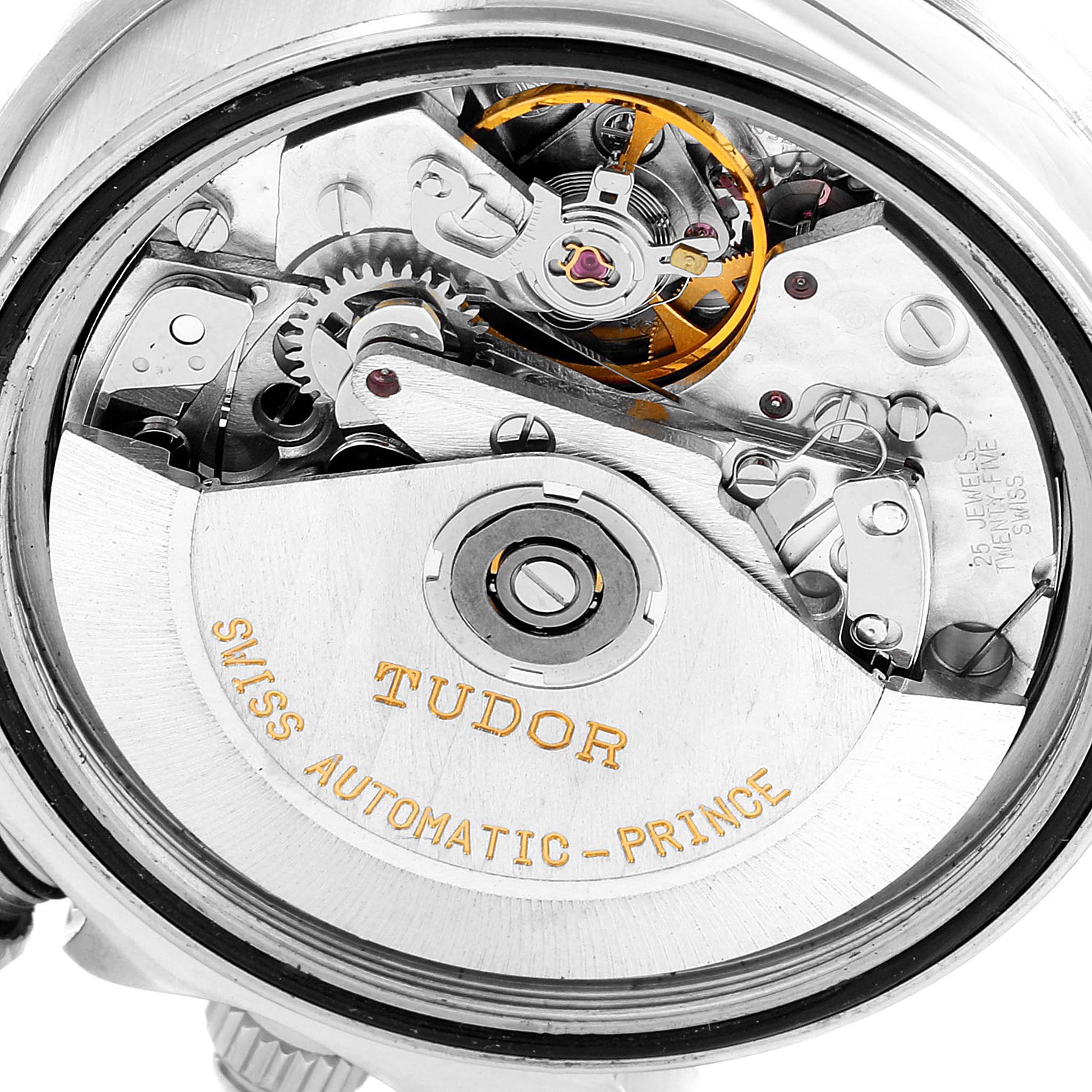 The image shows the inner mechanical components of the Tudor Tiger 79270 Men's Stainless Steel Black Dial 79270 Men's Stainless Steel Black Dial watch, including the movement and rotor.
